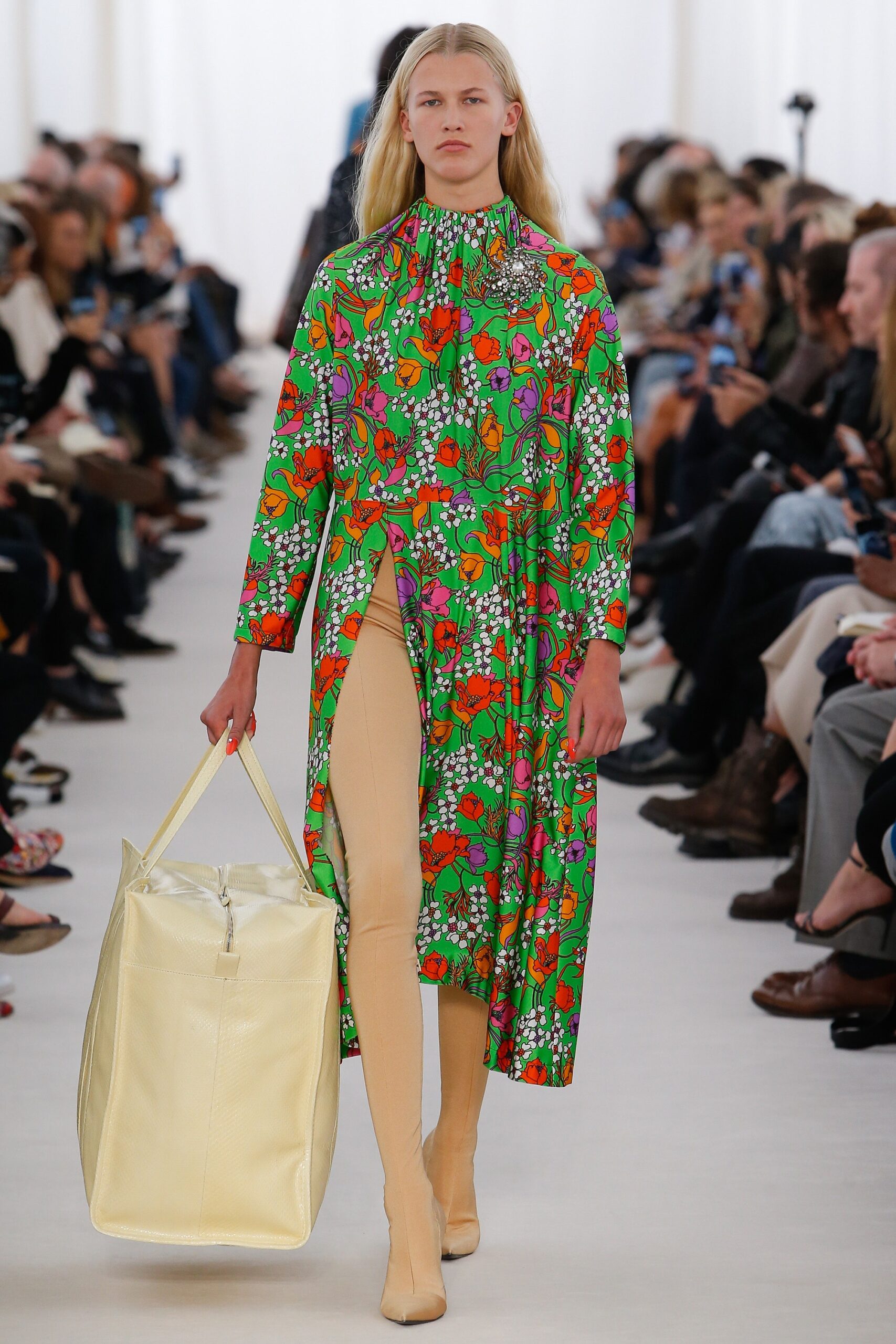 green printed midi dress with bag