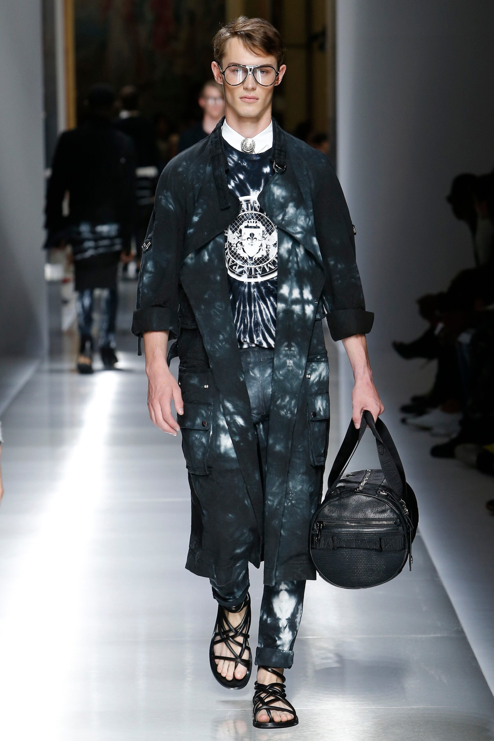 black relaxed coat with cargo pants