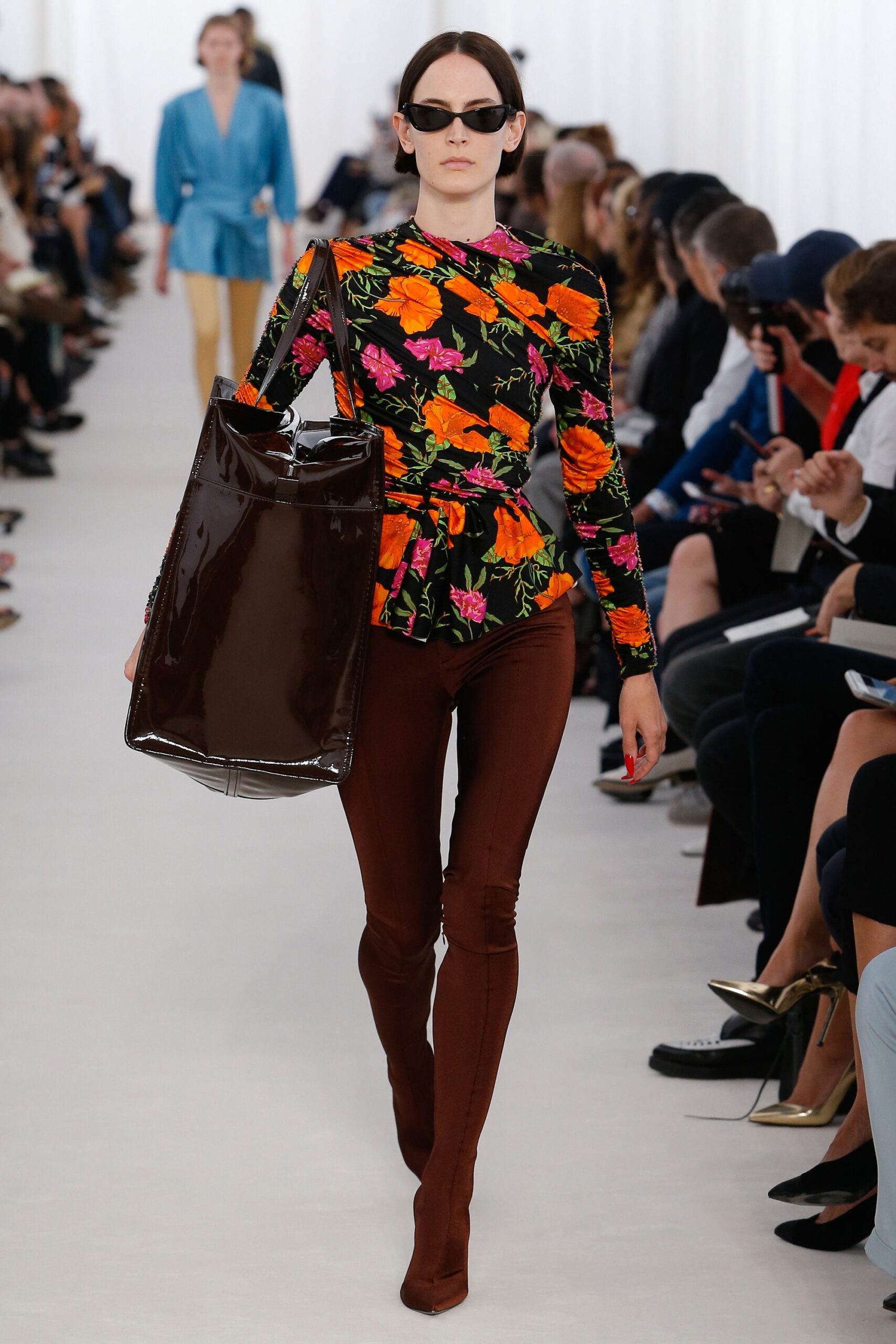 floral fitted top with brown pants