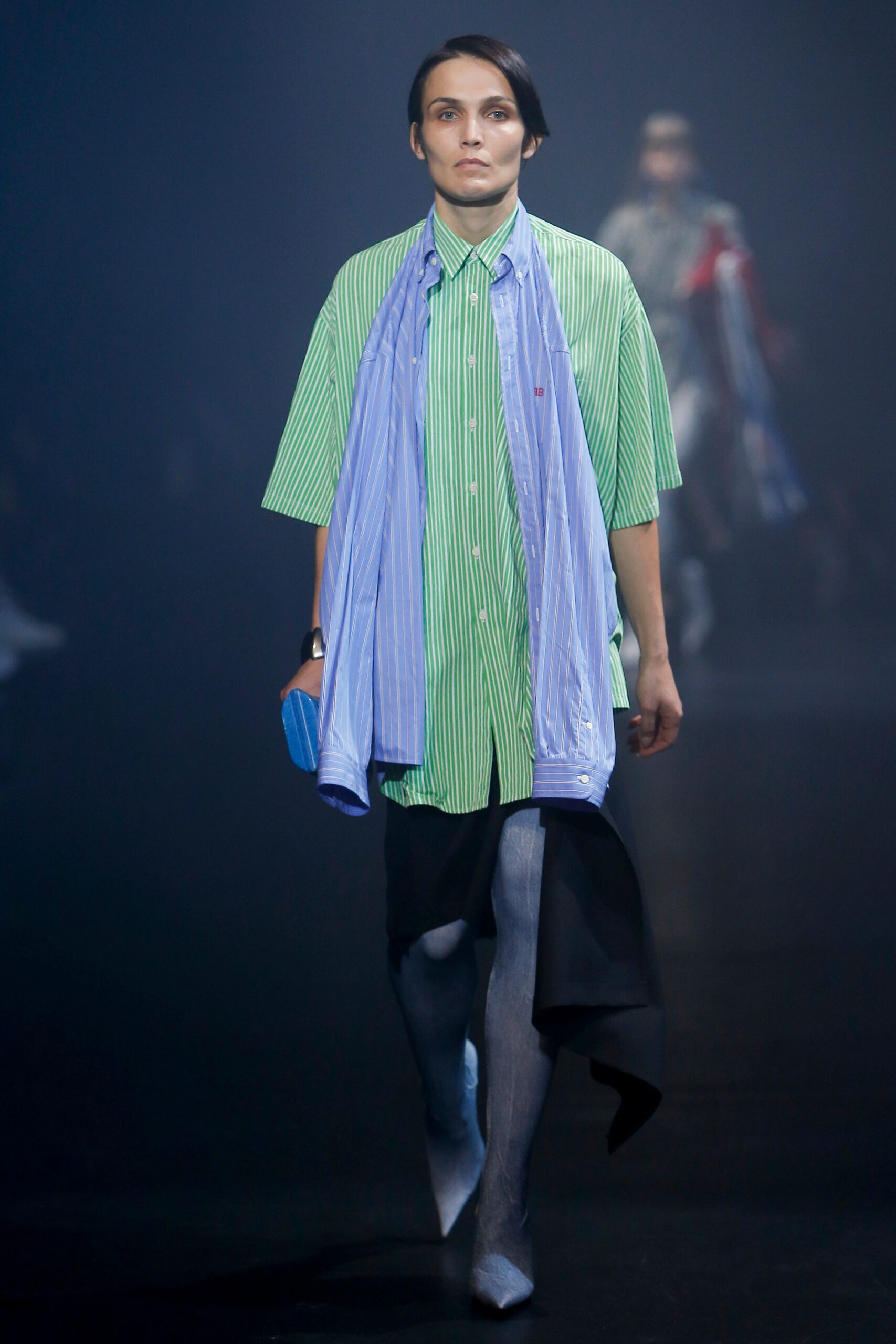 green striped shirt with black pants