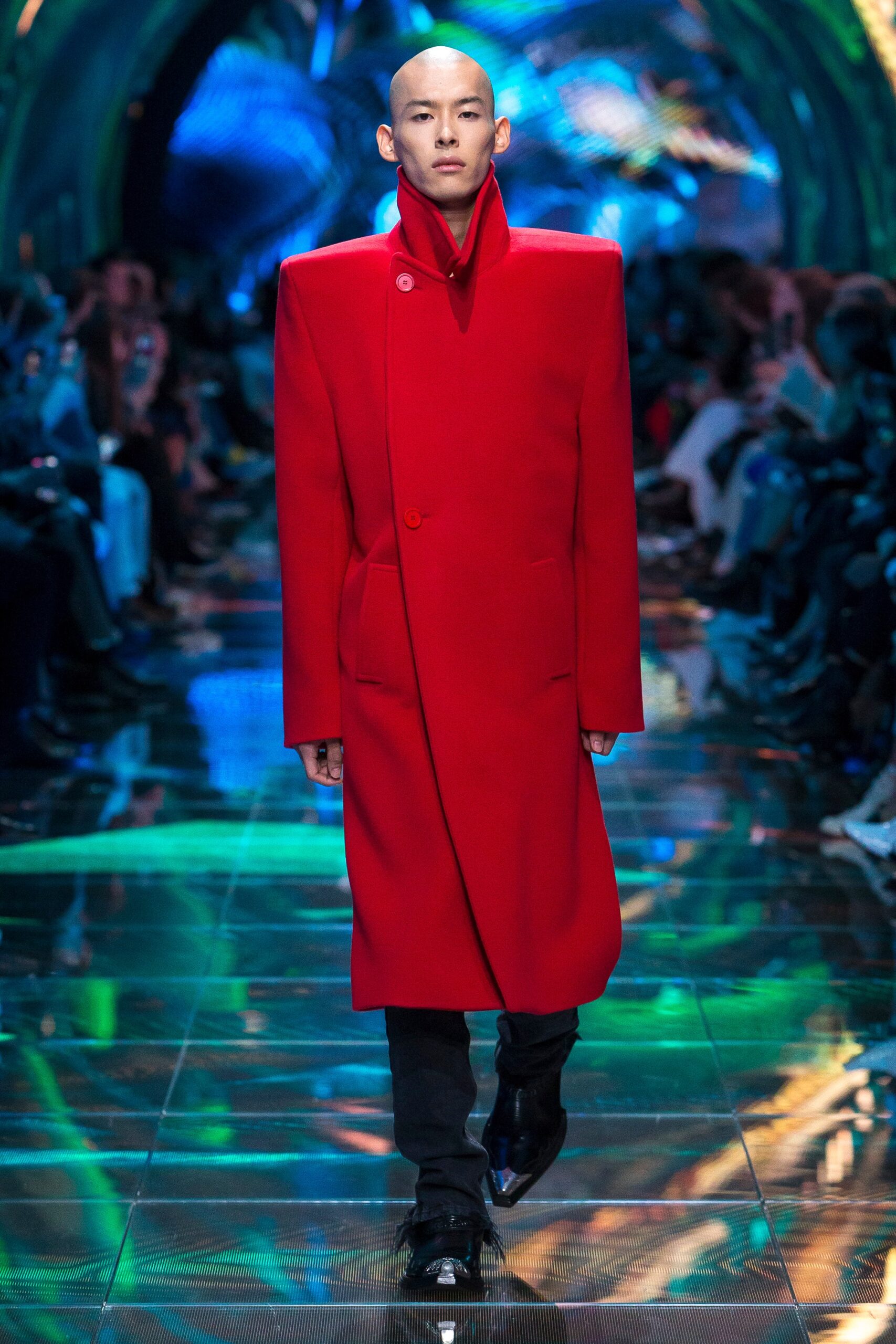 red structured coat with black pants