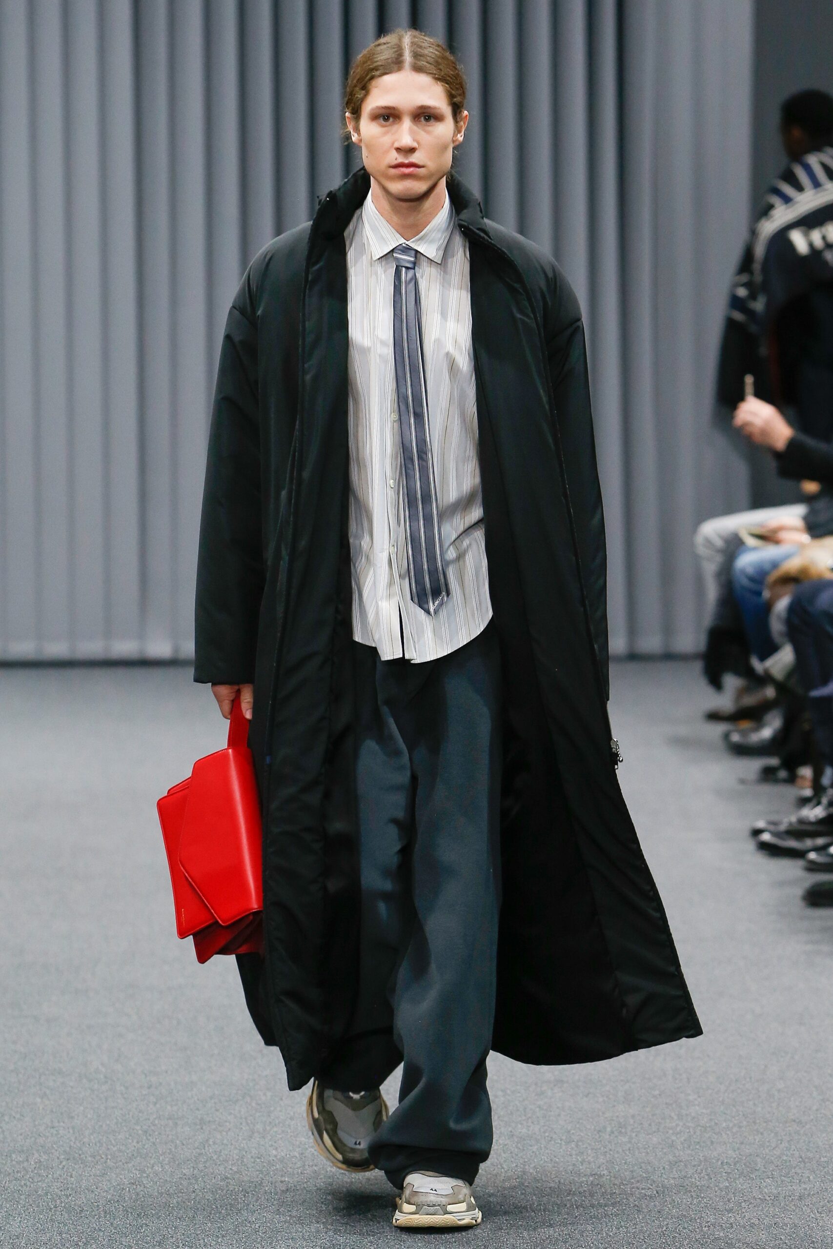 black coat with striped shirt