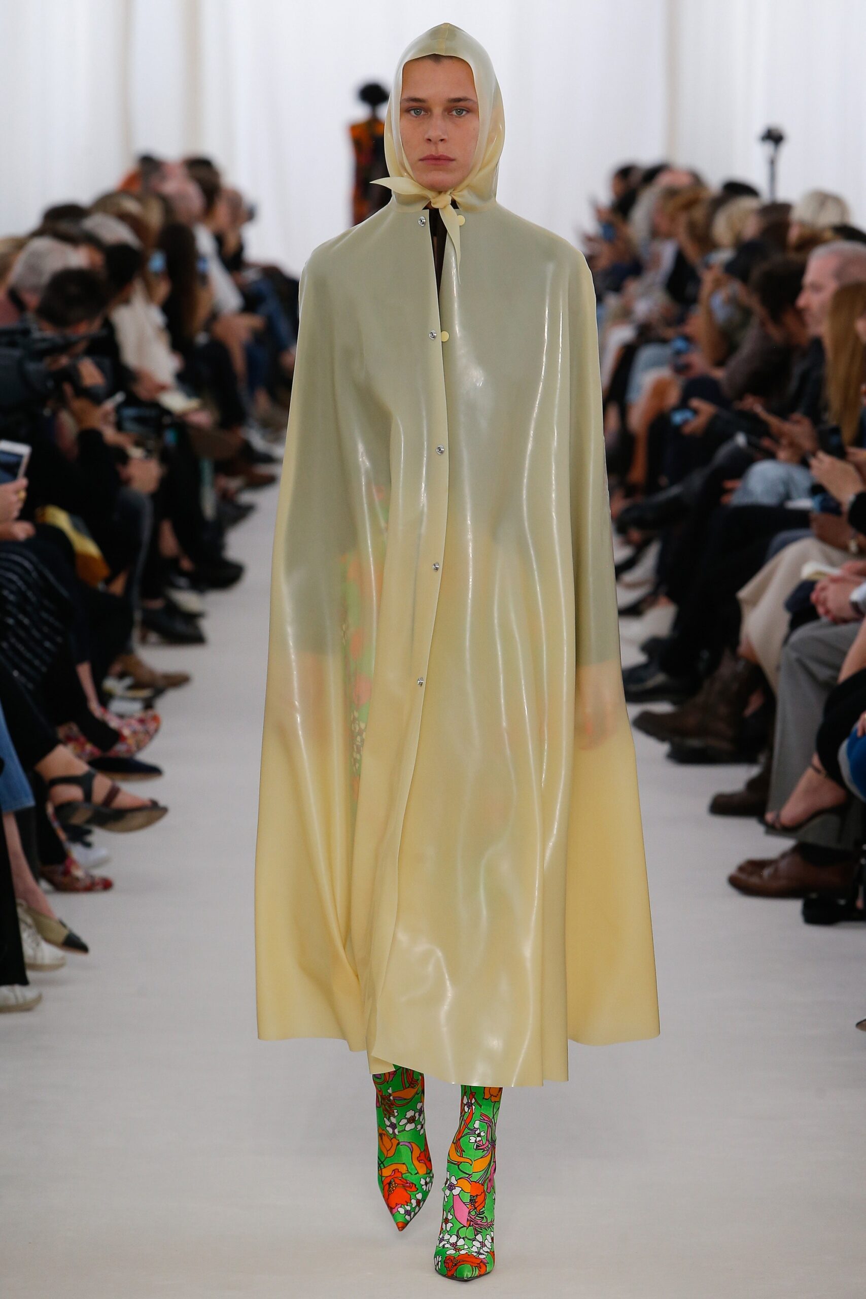 yellow vinyl cape with printed boots