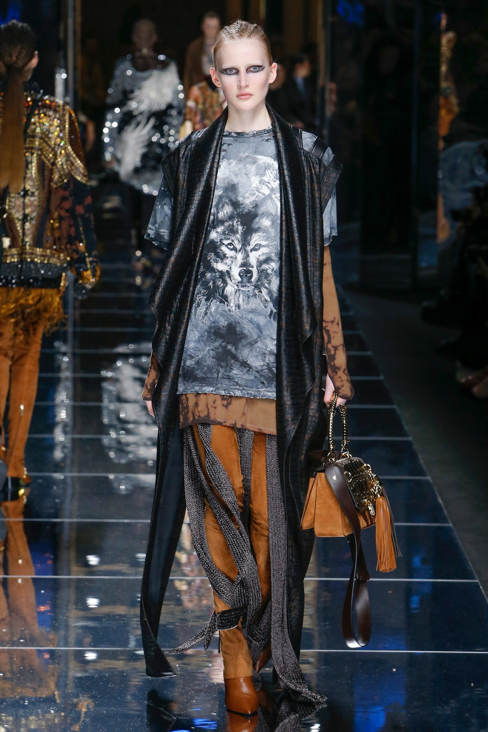 gray printed top with black coat