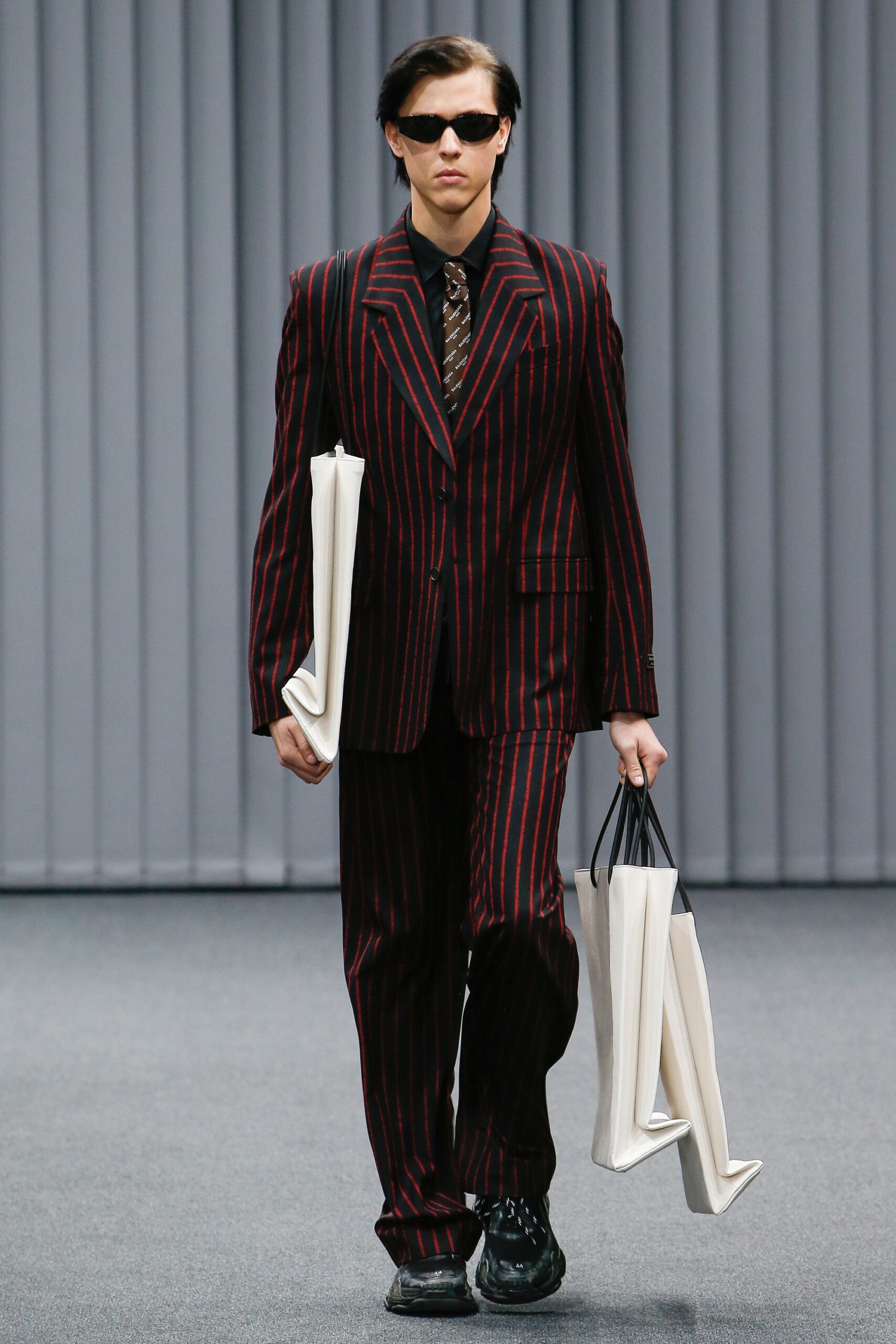 black and red striped suit