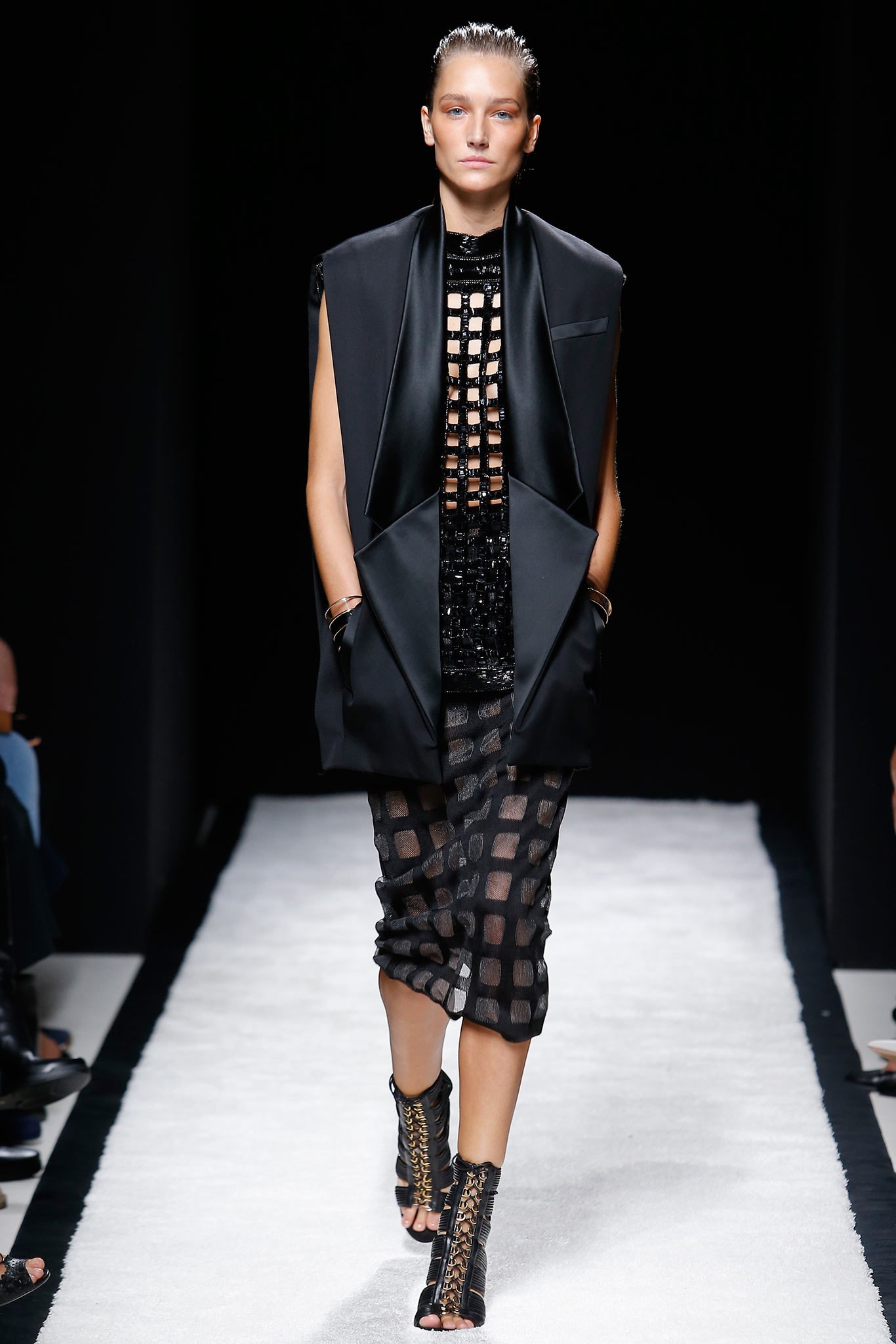 black silk sleeveless structured buttoned jacket