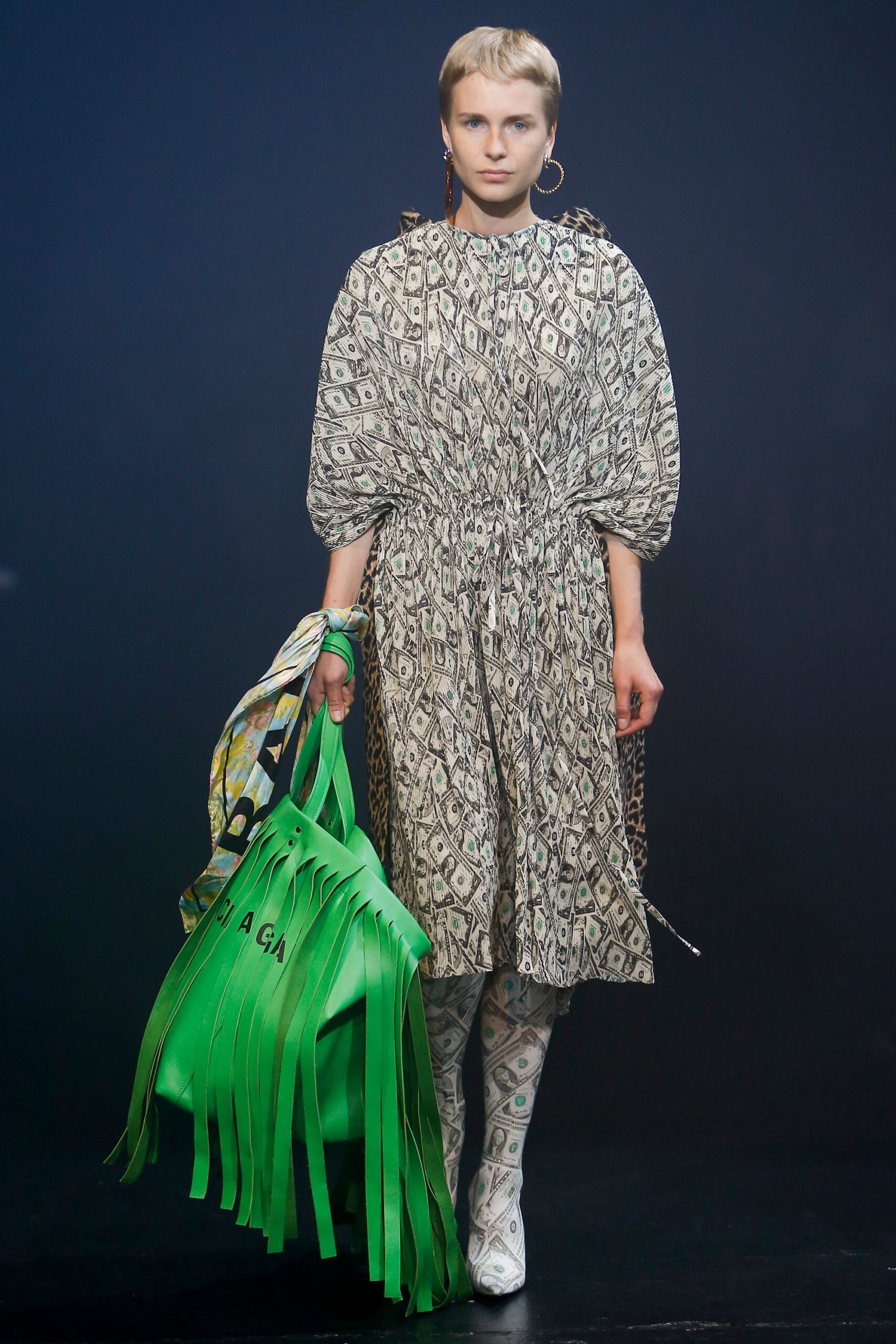 relaxed printed midi dress and fringed bag