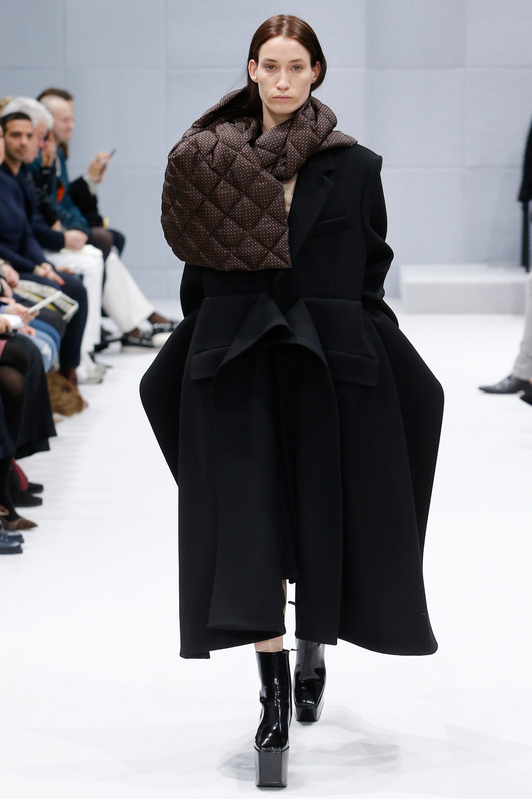 black wool long-sleeve collared oversized draped coat