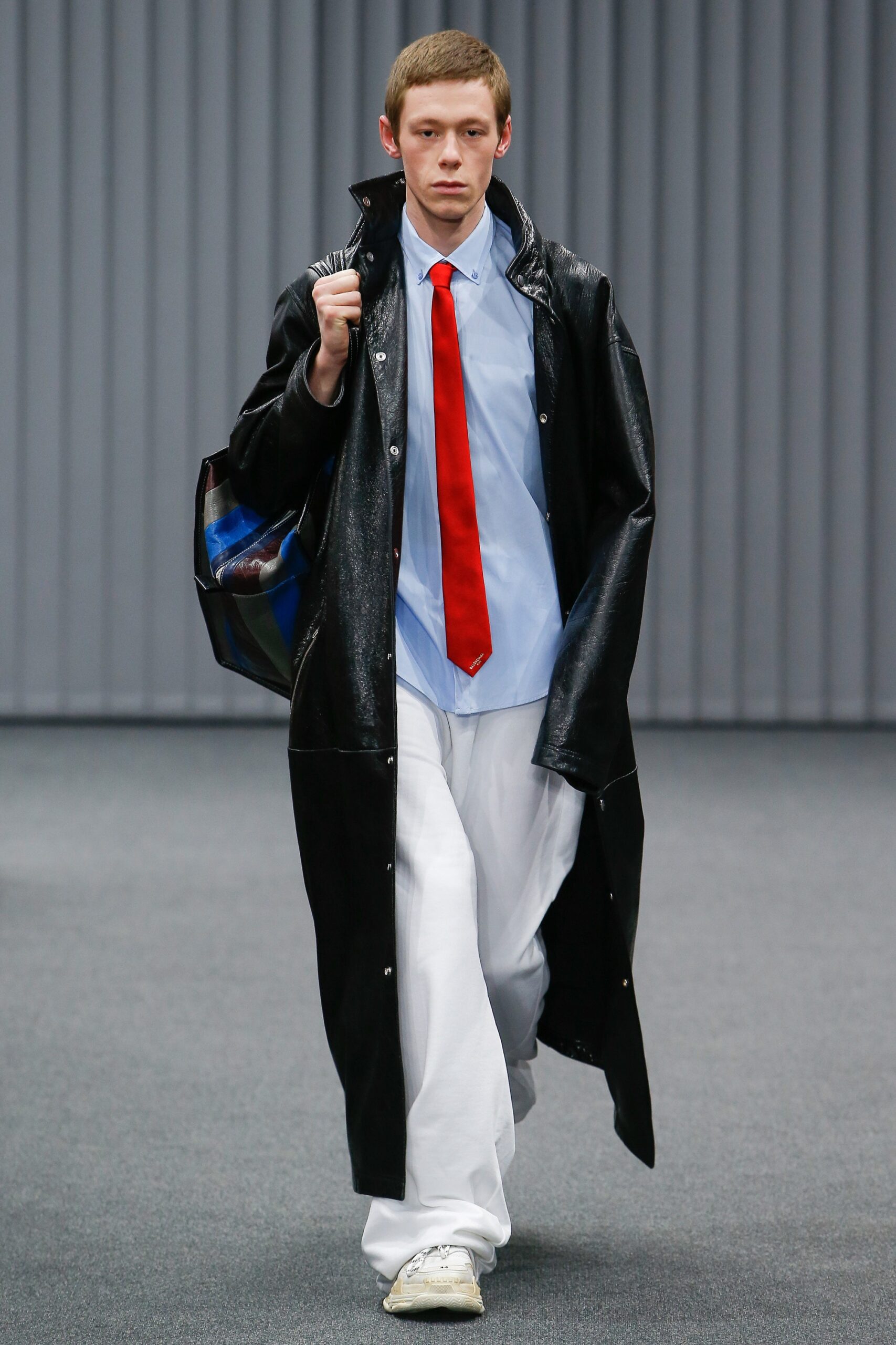 black vinyl coat with blue shirt