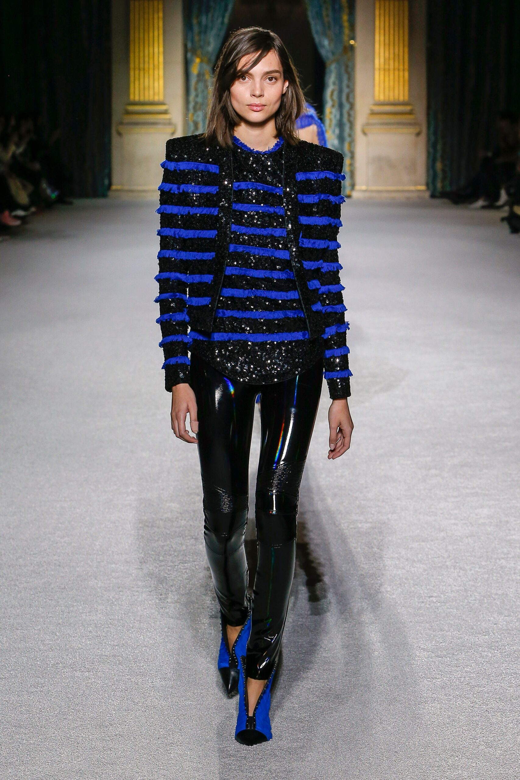 blue sequin jacket with vinyl pants