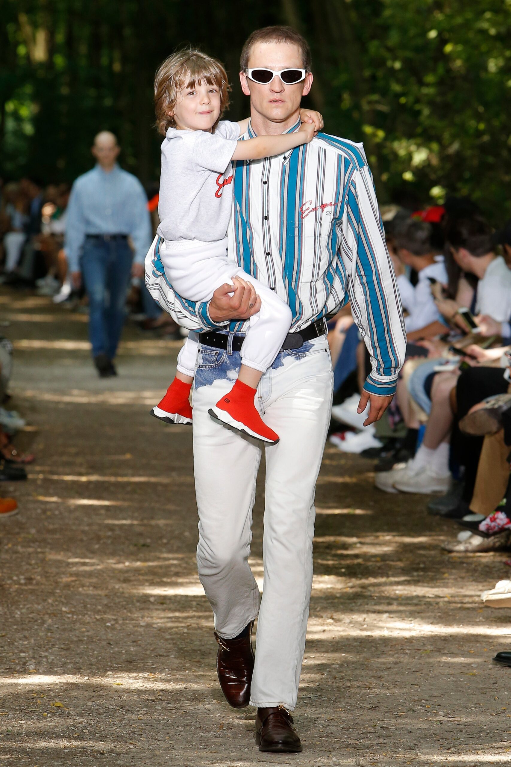 blue and white striped shirt with white pants