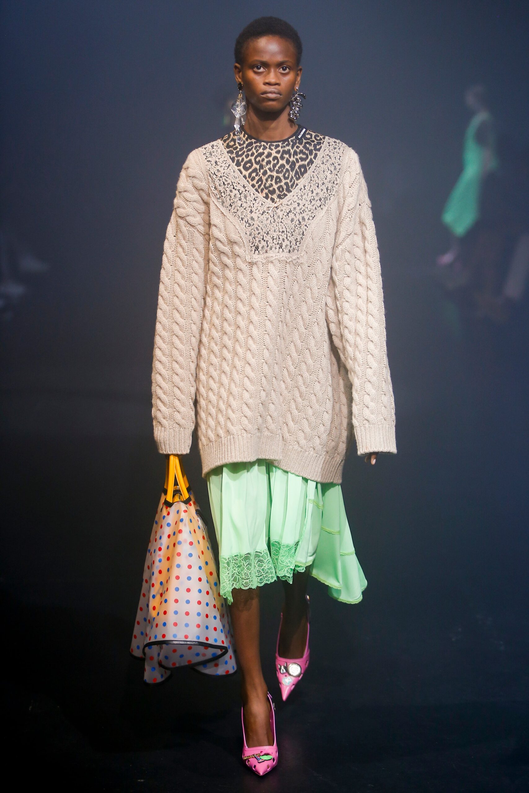 beige oversized sweater with green dress