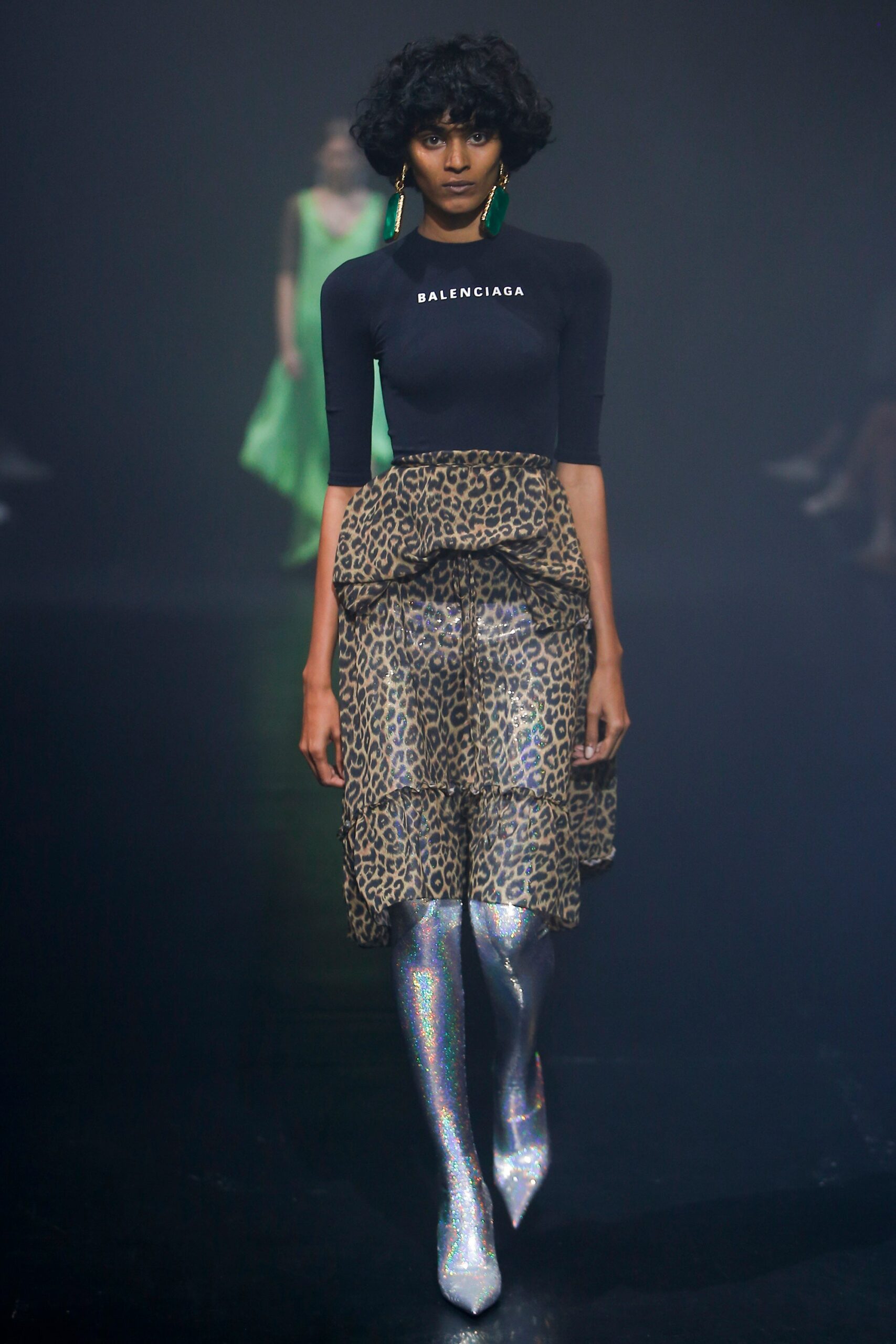 black fitted top with animal-print skirt