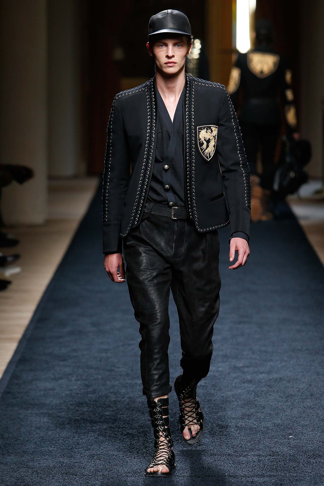 black fitted jacket with relaxed pants