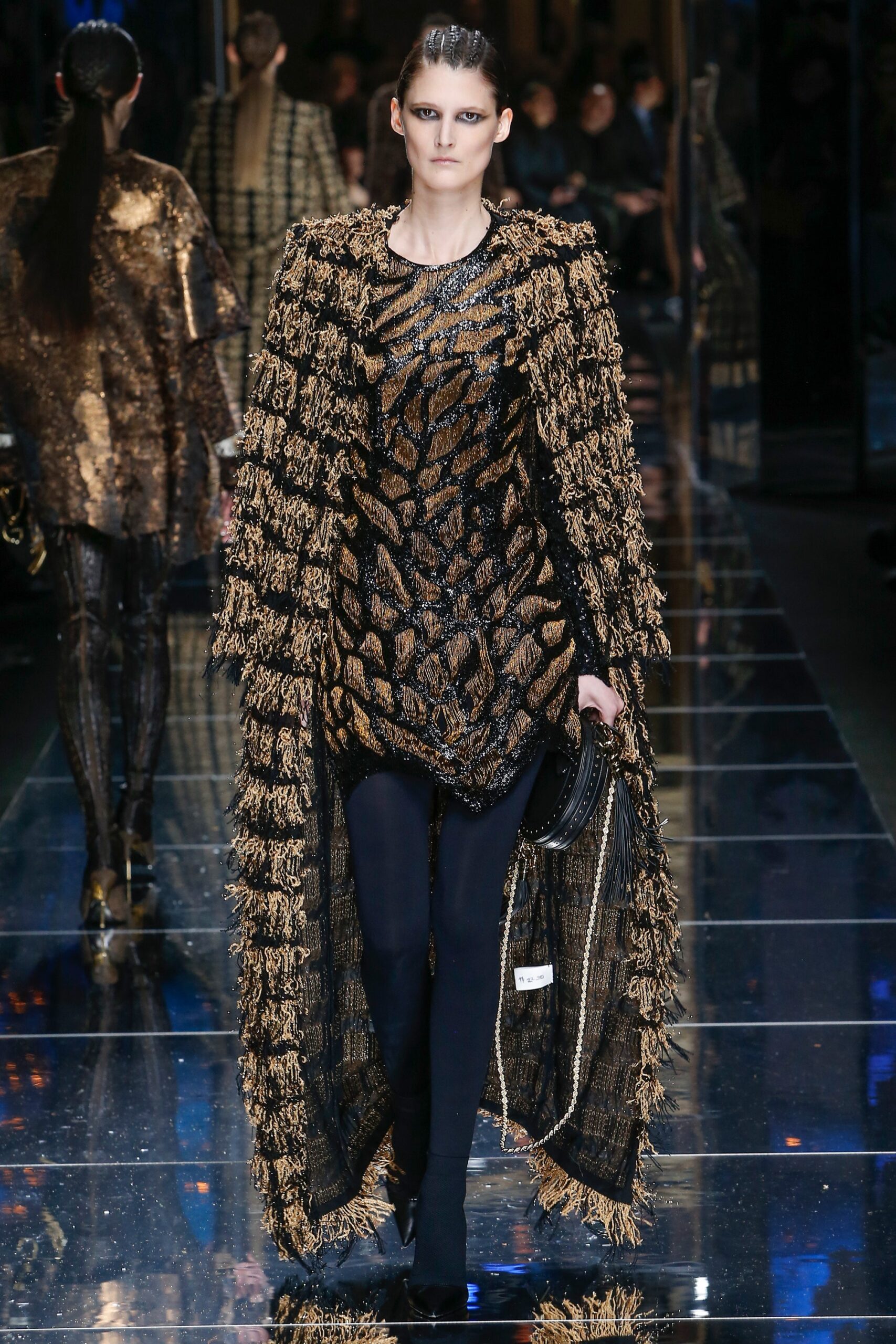 black and gold fringed dress and coat