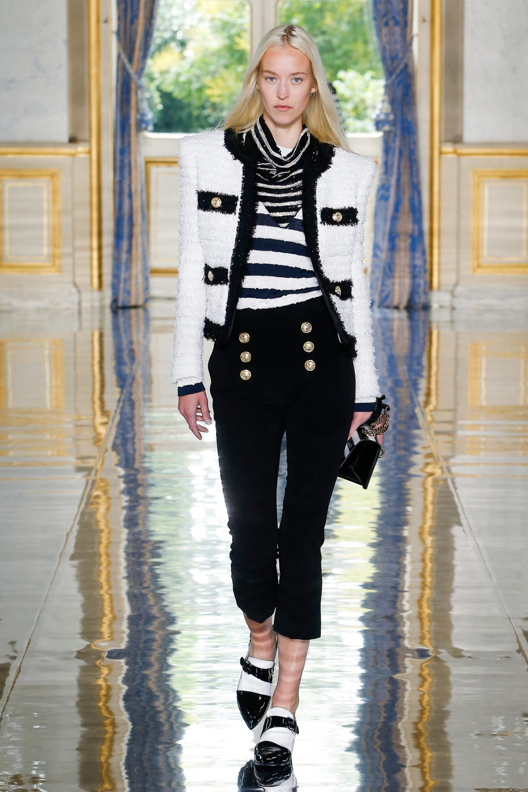 tailored black and white jacket with fitted pants