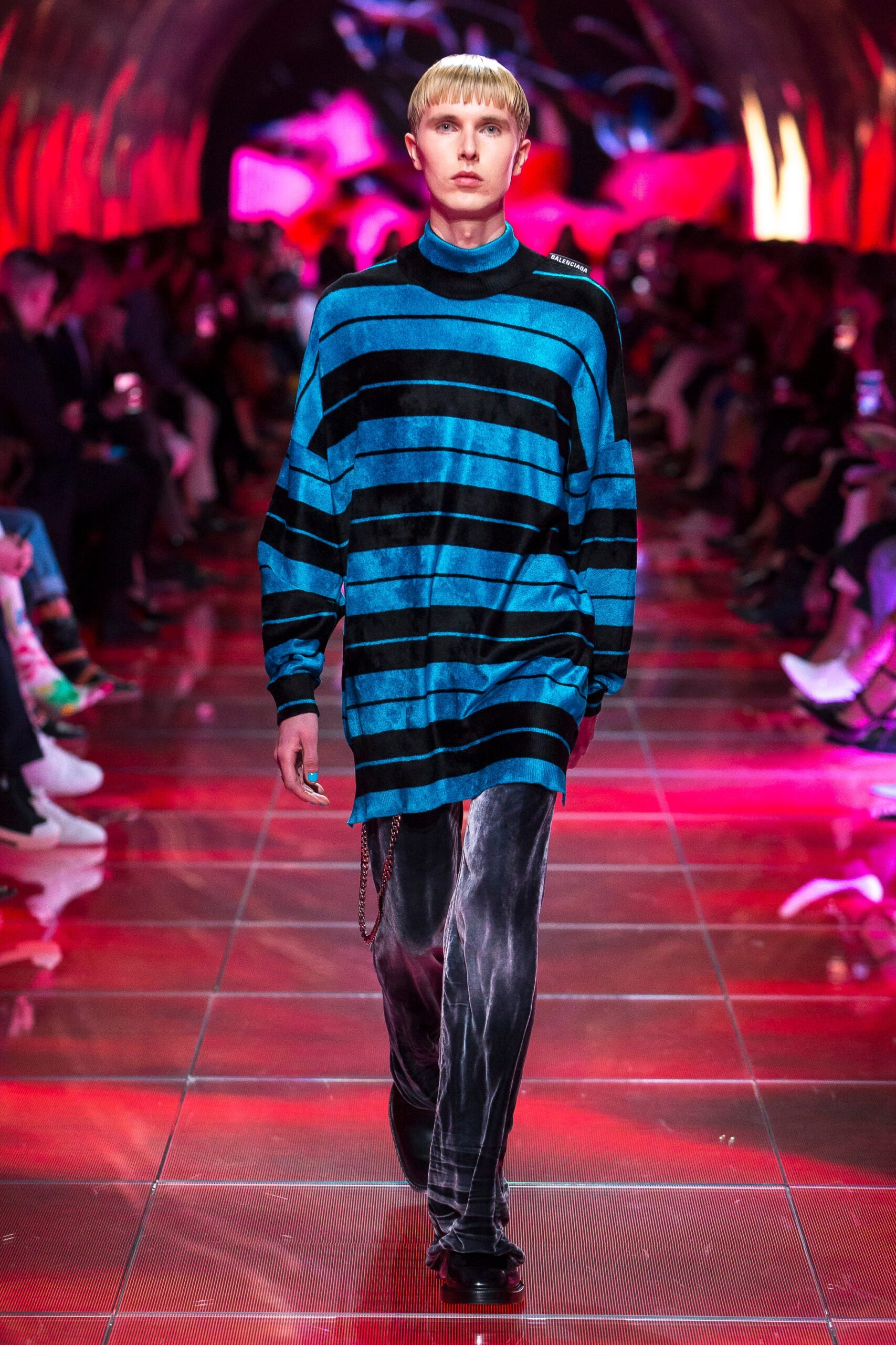 blue striped relaxed top with black slim pants