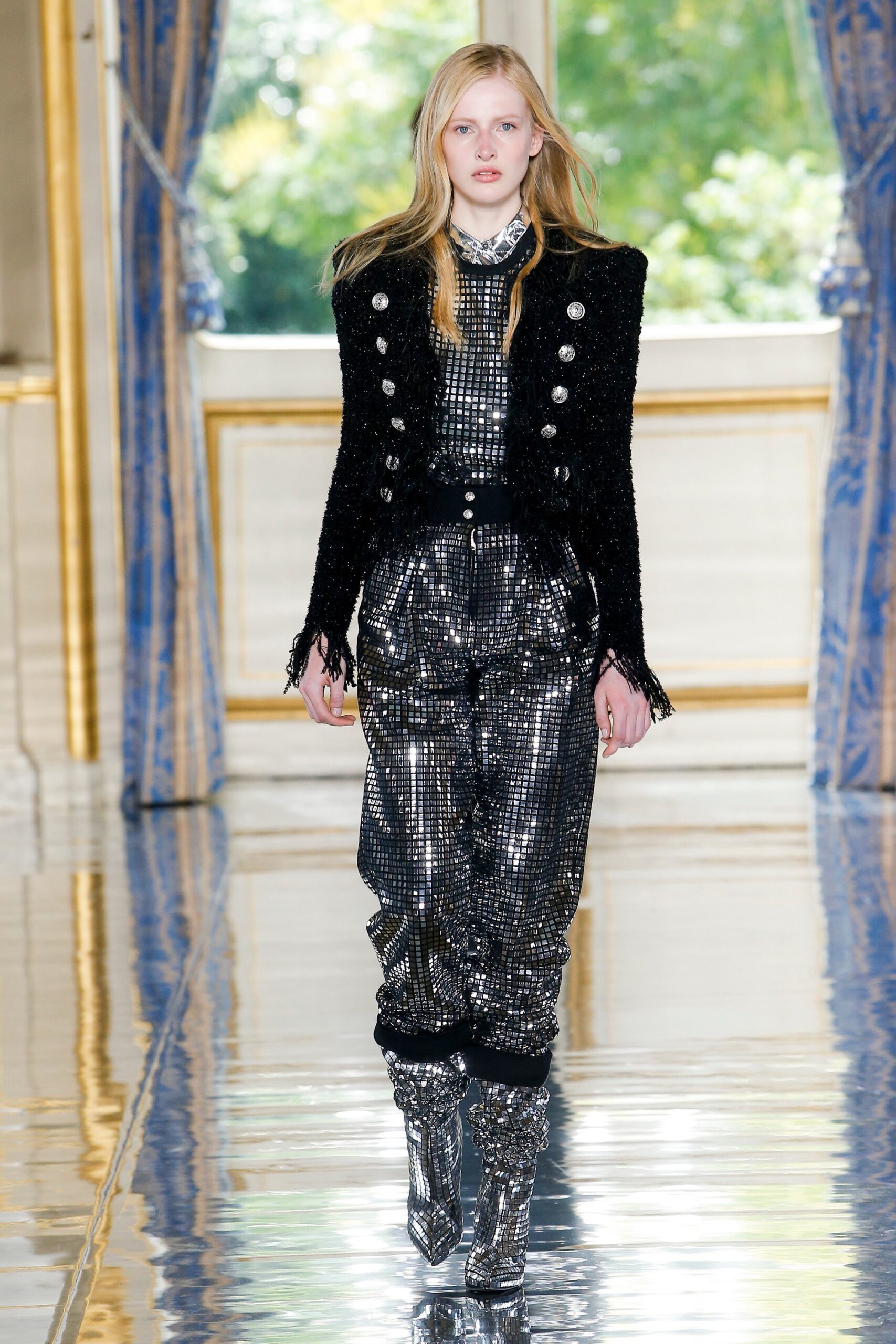 black fitted jacket with silver pants