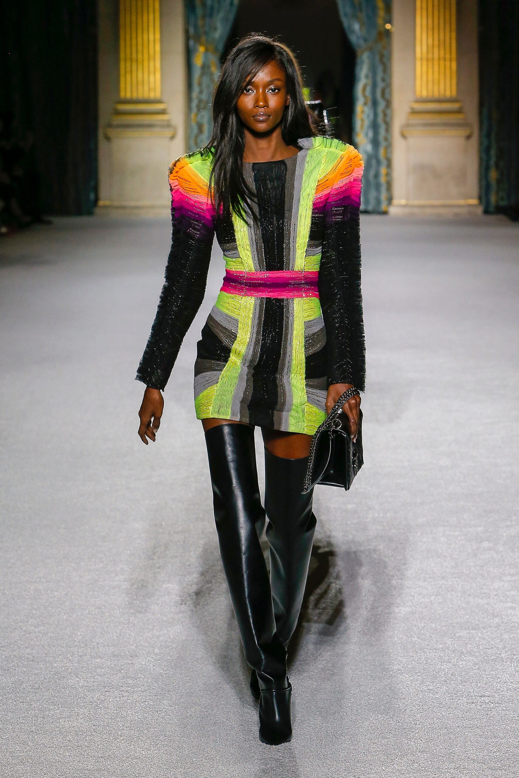 colorful mini-dress with high boots