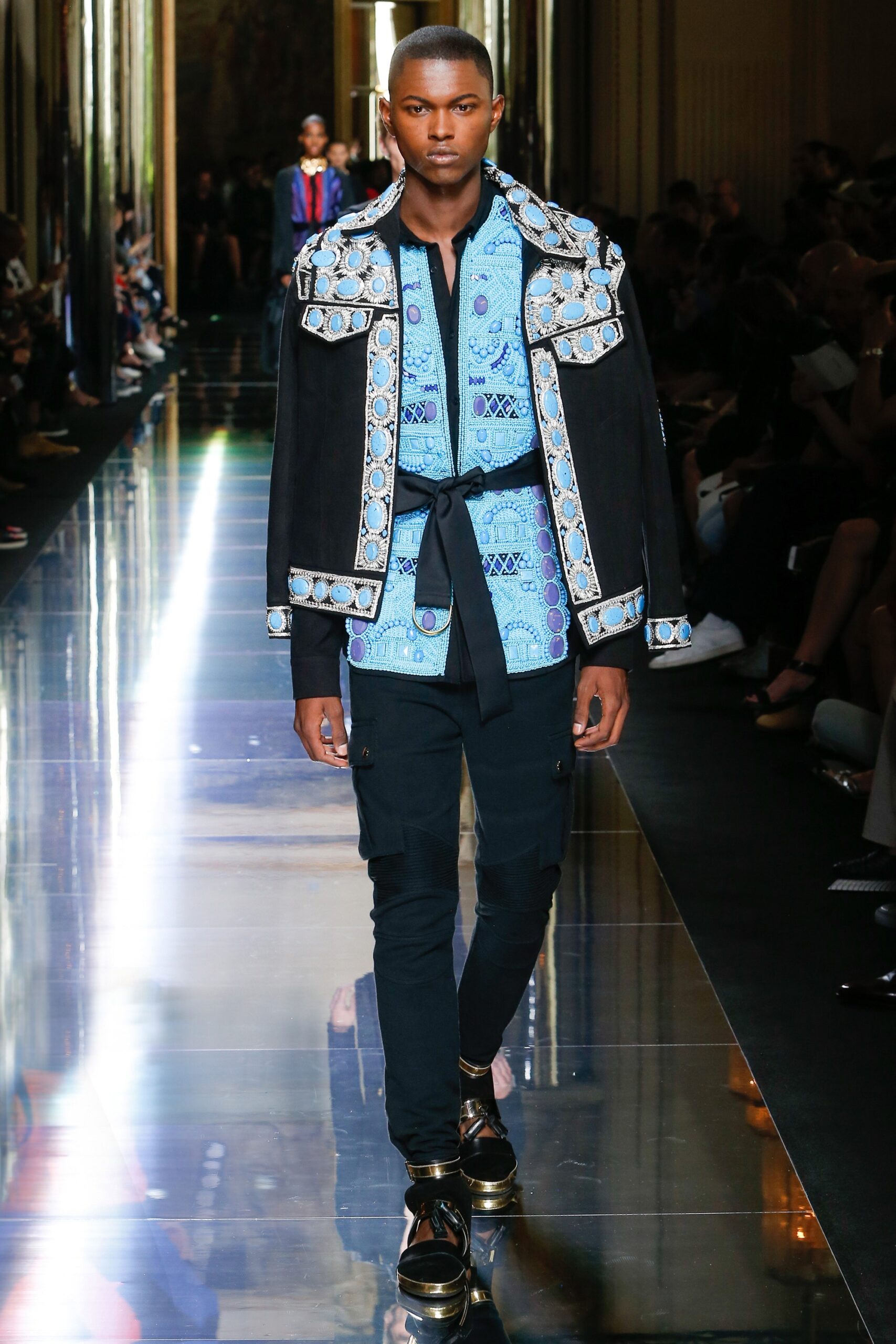black fitted jacket with blue shirt