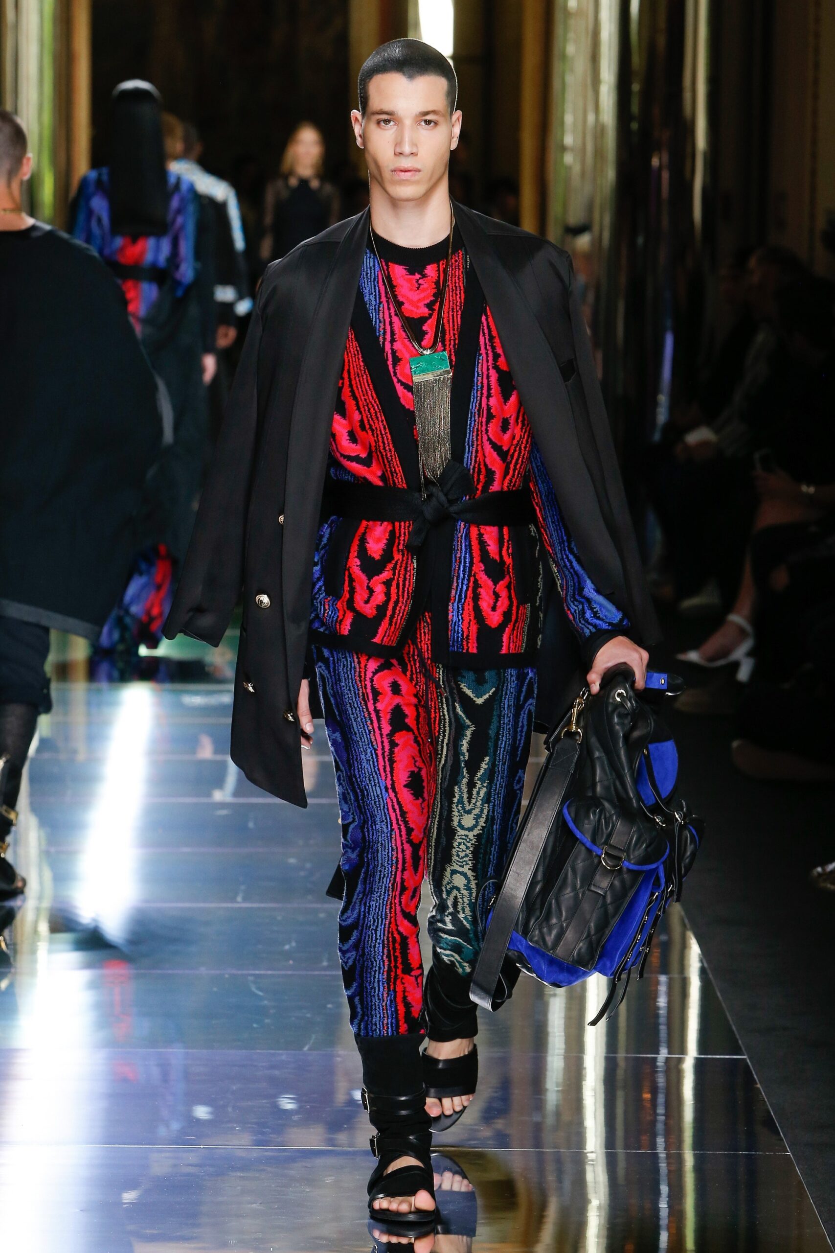 black jacket with printed top and pants