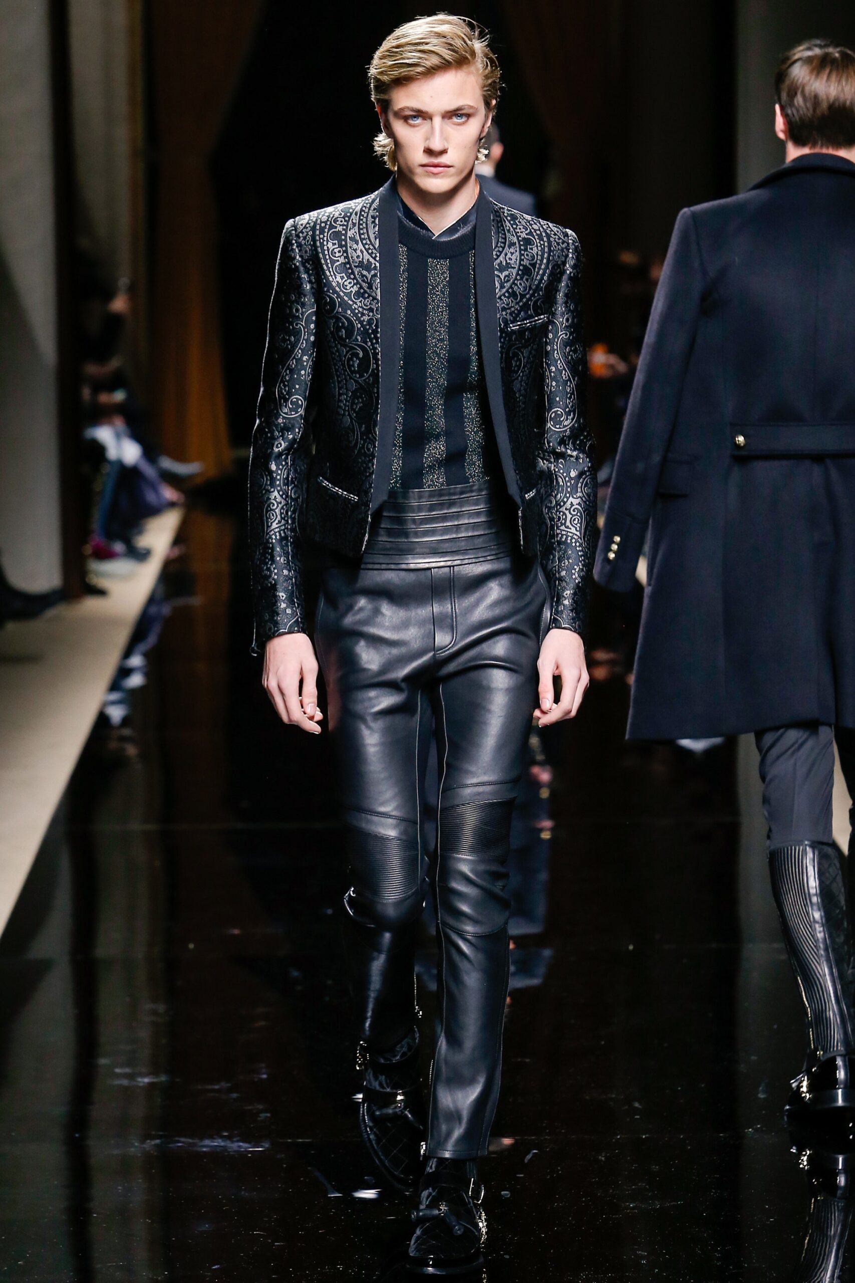 black embroidered jacket and leather pants