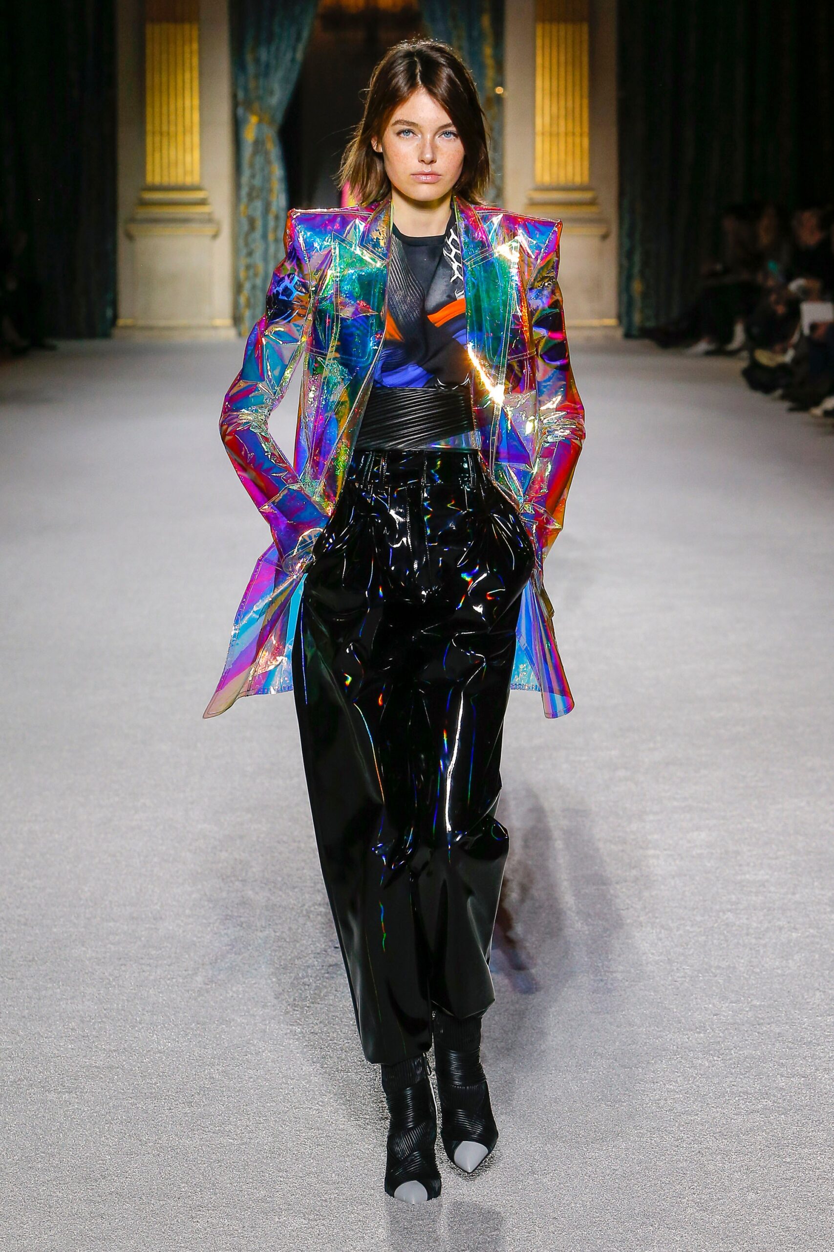 multi-colored vinyl blazer and black pants