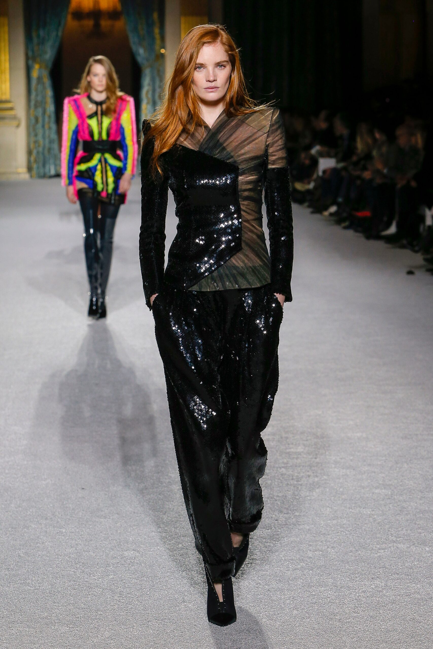 black sequined fitted top and relaxed pants