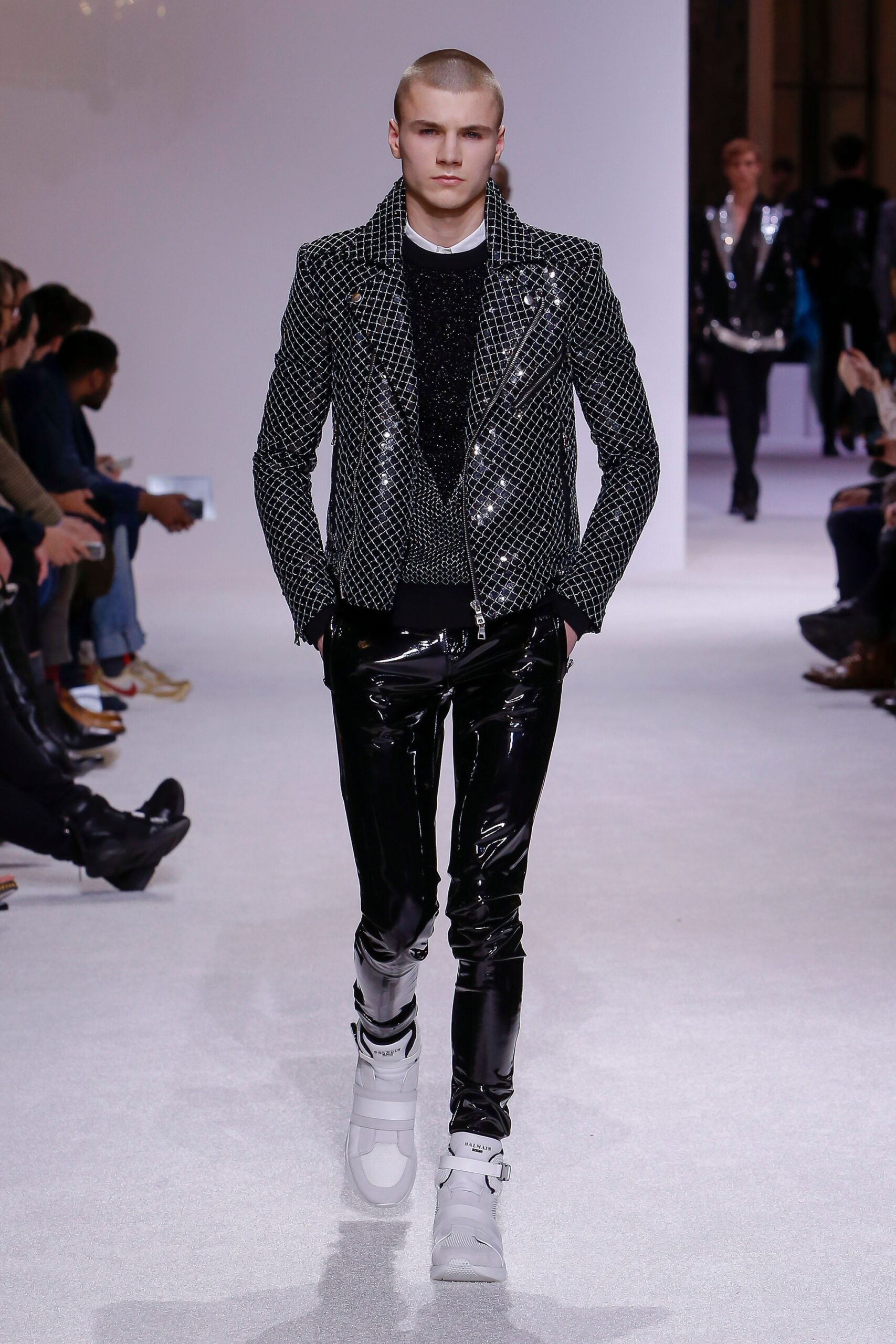 black leather fitted jacket with vinyl pants