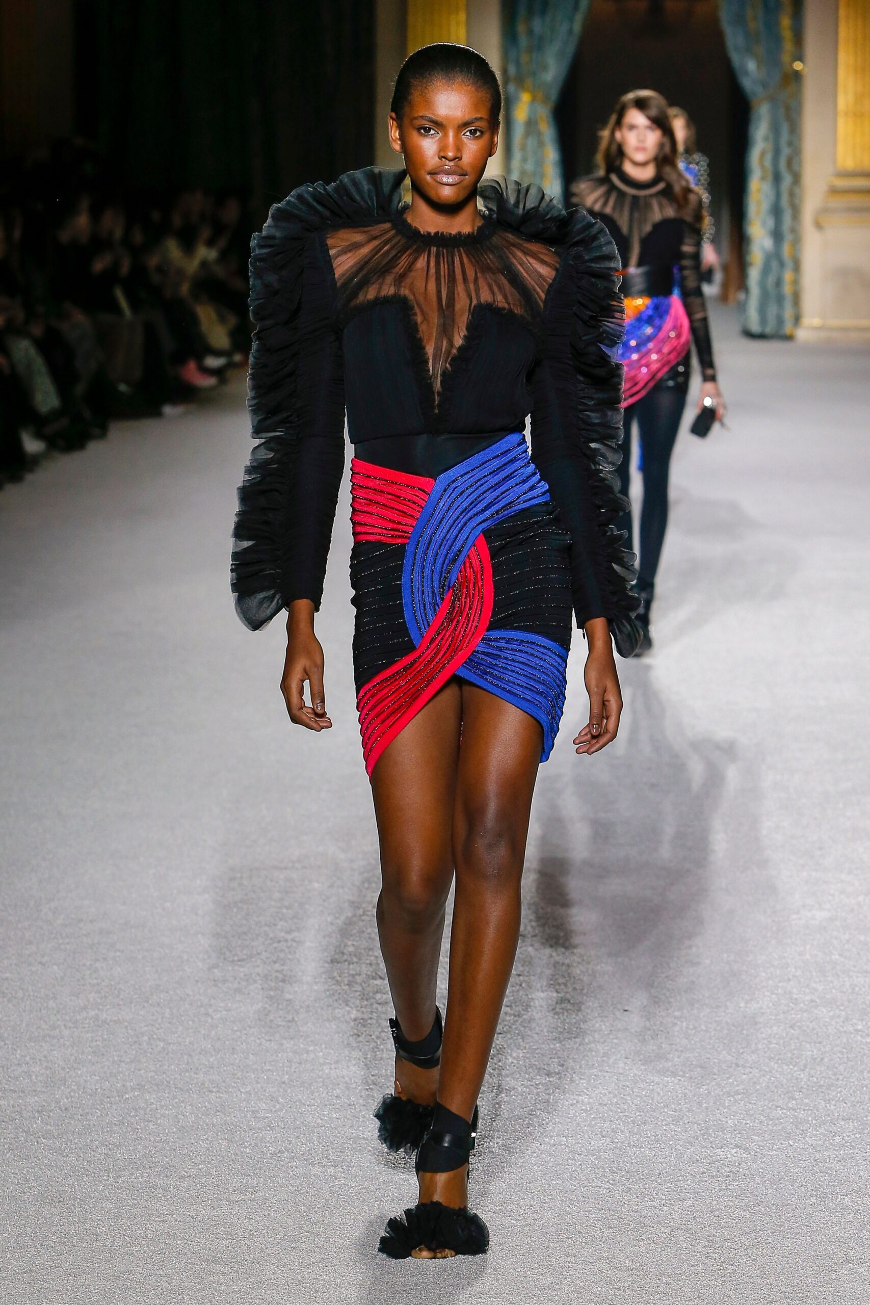 black ruffled top with asymmetric skirt