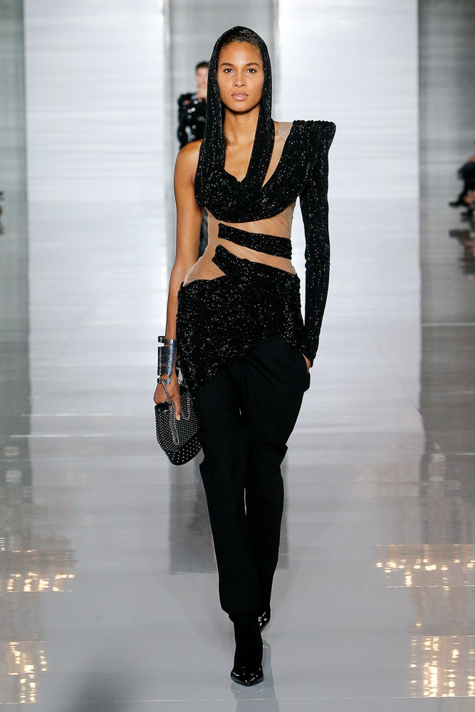 black fitted top and slim pants