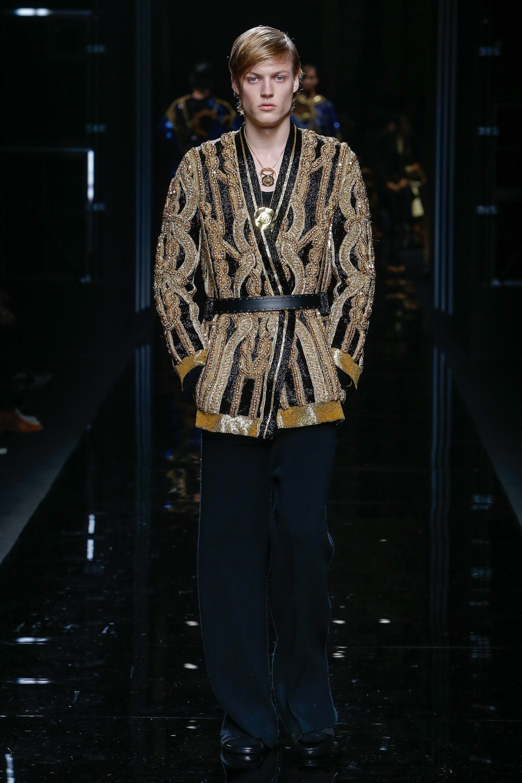 black and gold embroidered jacket with tailored pants