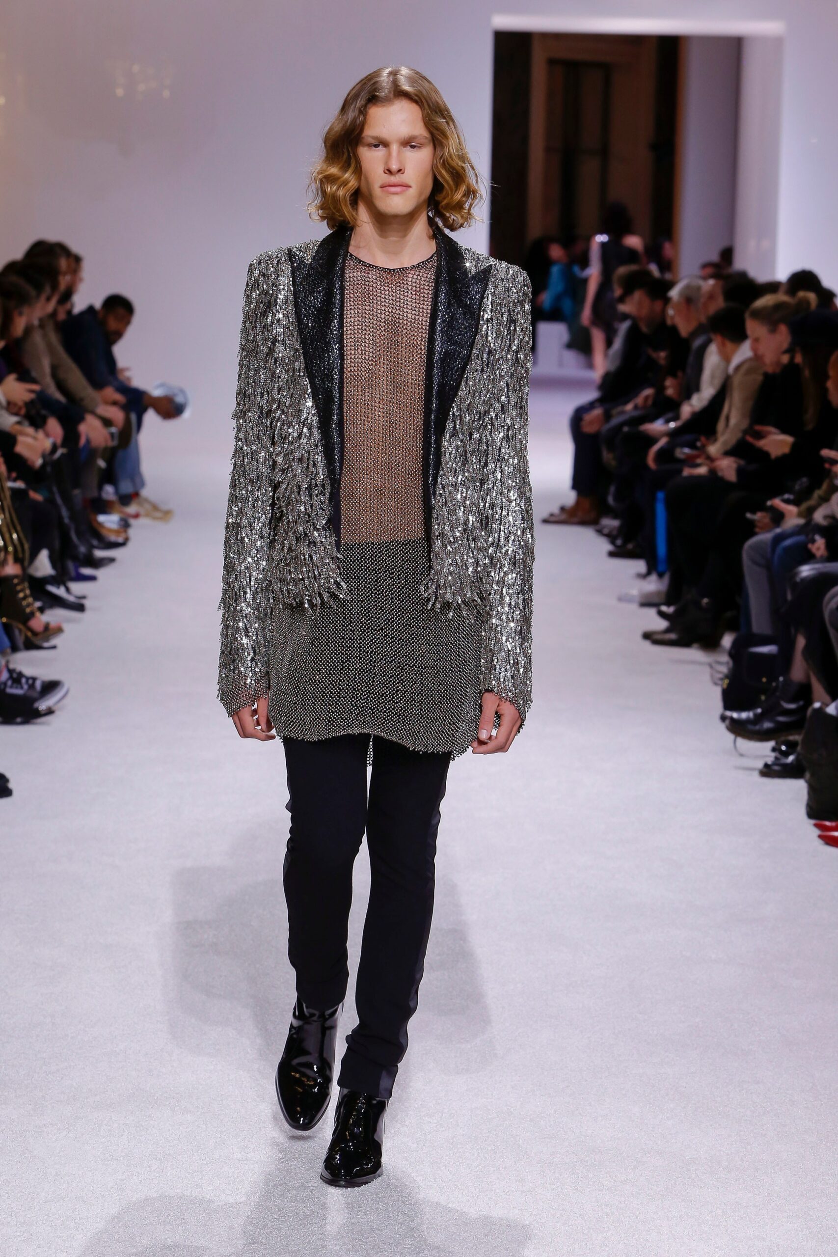 silver fringed blazer with gray top