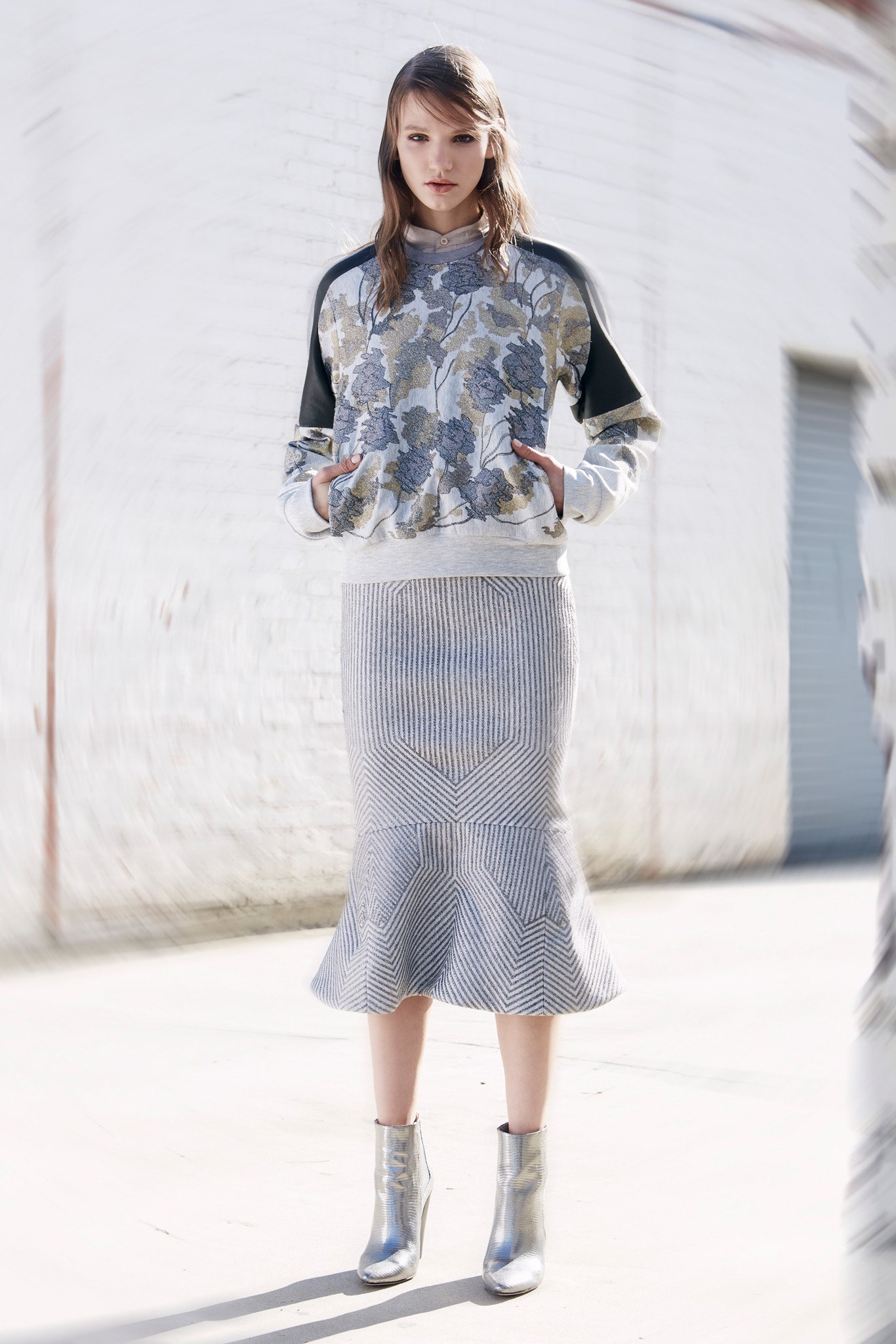 gray embroidered top with flared skirt