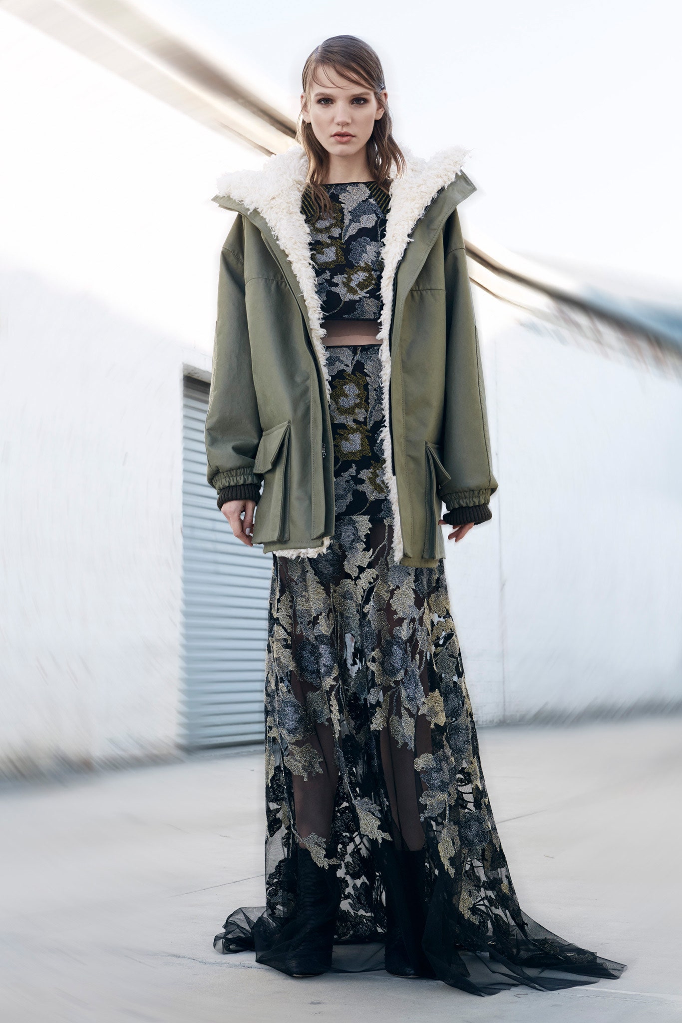 green coat and black lace dress
