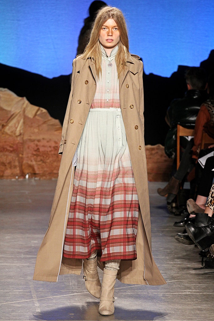 beige trench coat and tiered dress