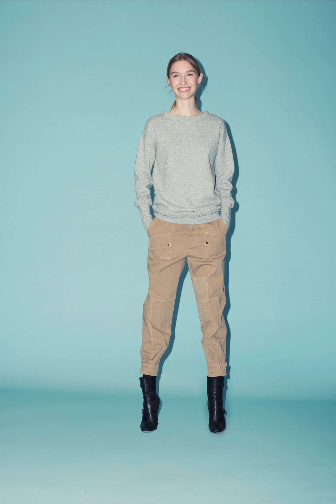 gray relaxed sweater with cargo pants