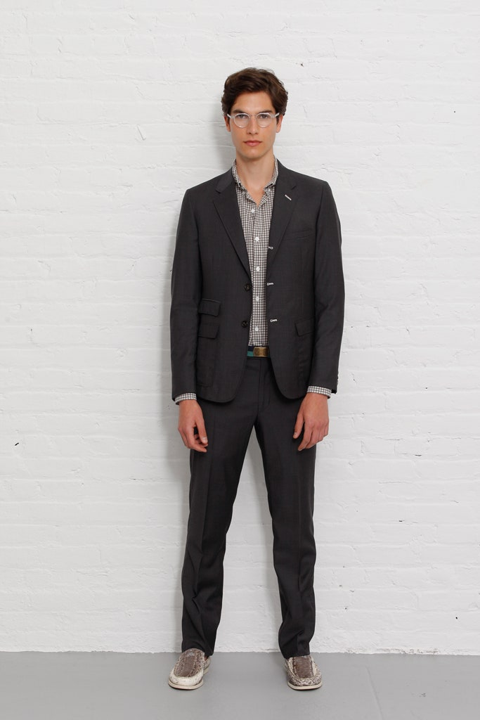 gray tailored suit with checked shirt