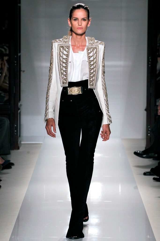 tailored white blazer with black pants