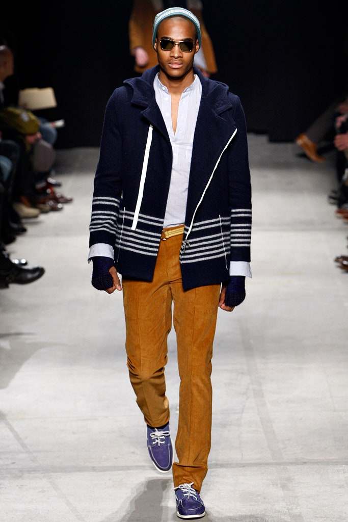 navy striped jacket with brown pants