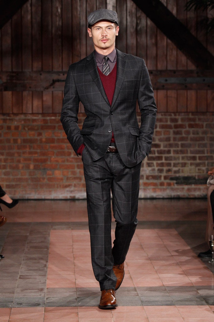 gray tailored suit with red vest