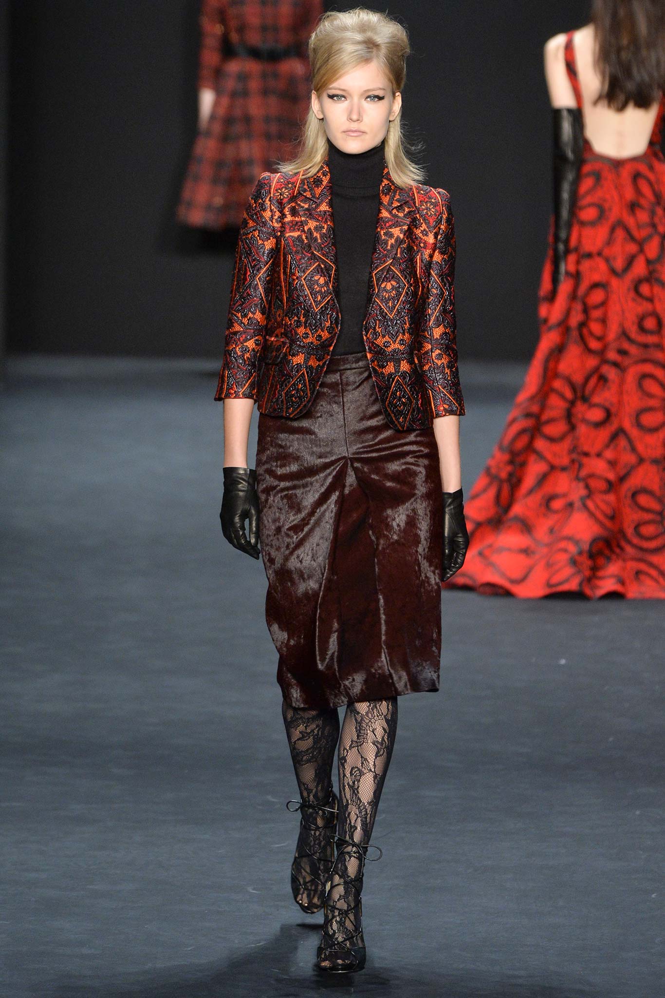 red embroidered blazer with velvet skirt