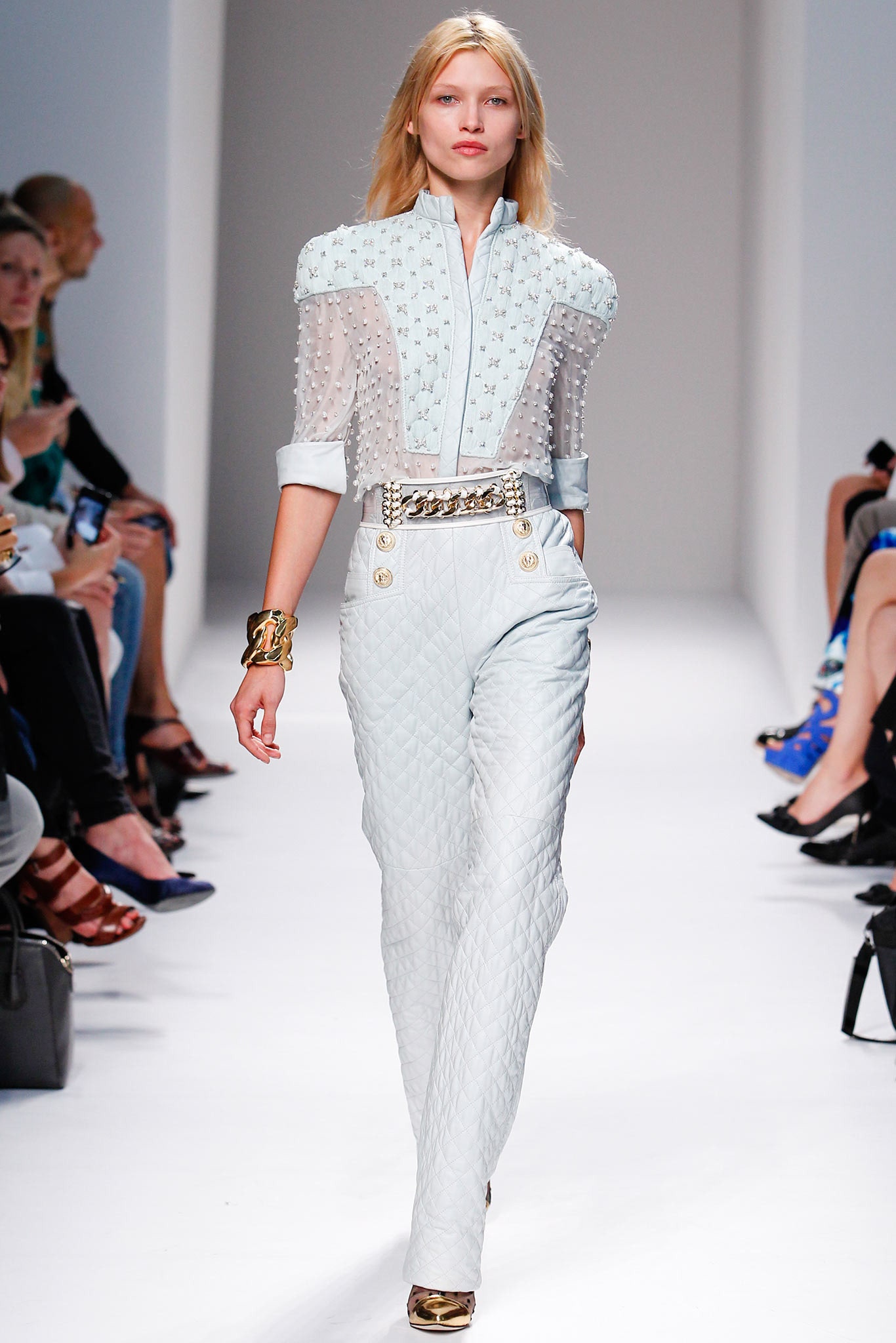 white embroidered blouse with light blue pants