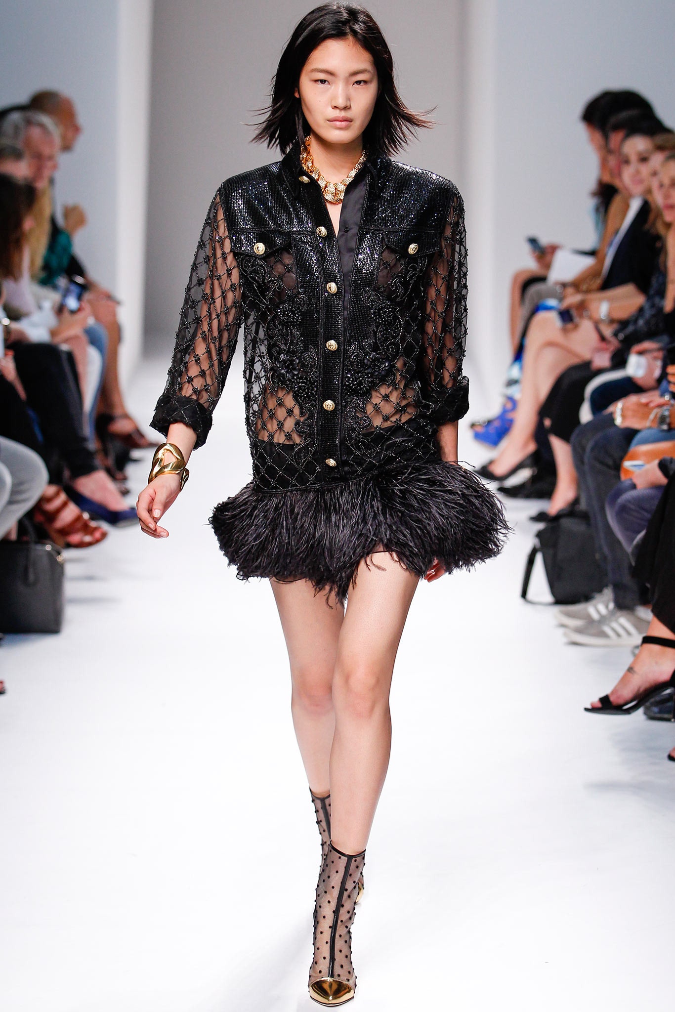 black mesh shirt with feathered skirt