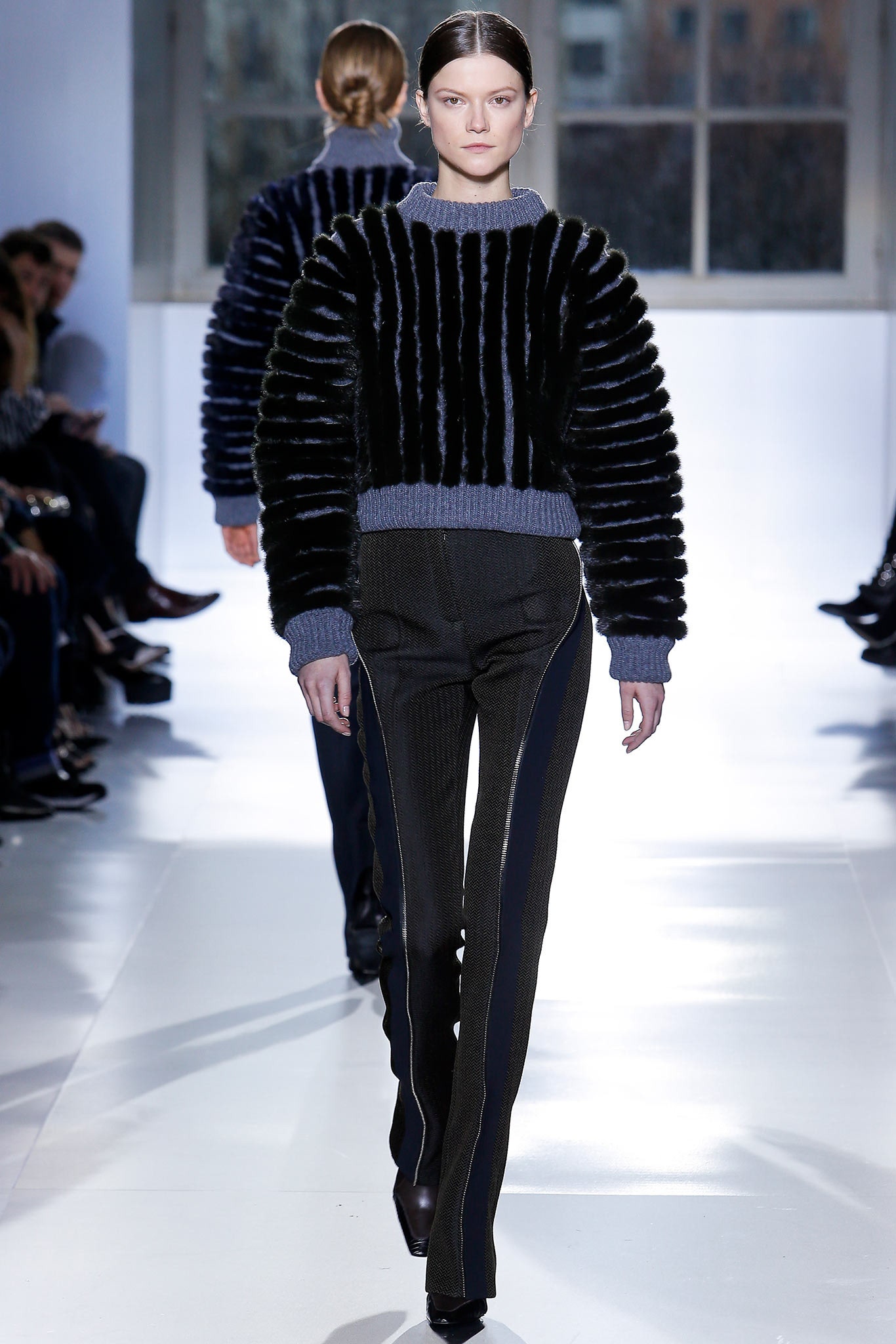 black fur fitted sweater and slim pants