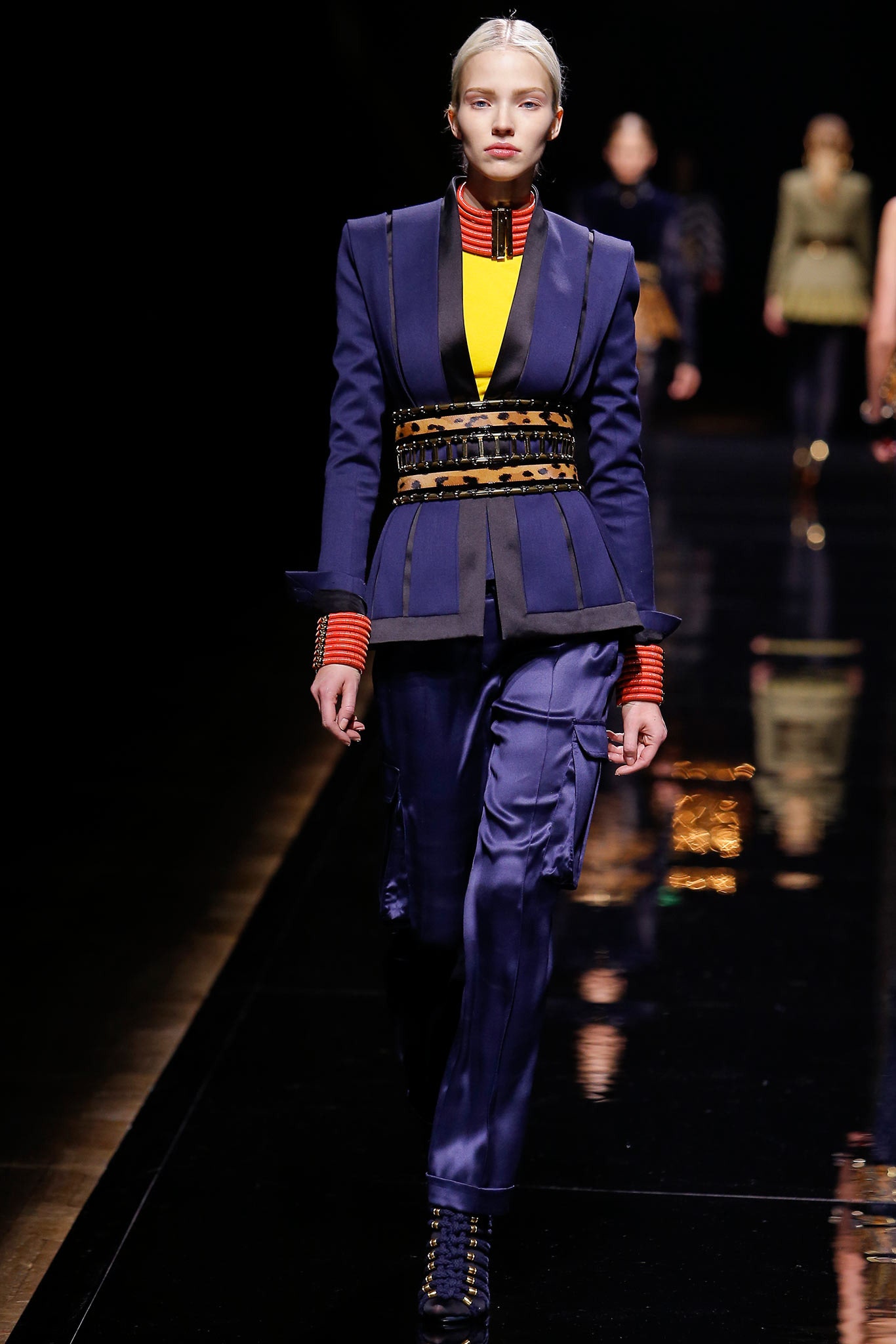 blue tailored suit with yellow accents