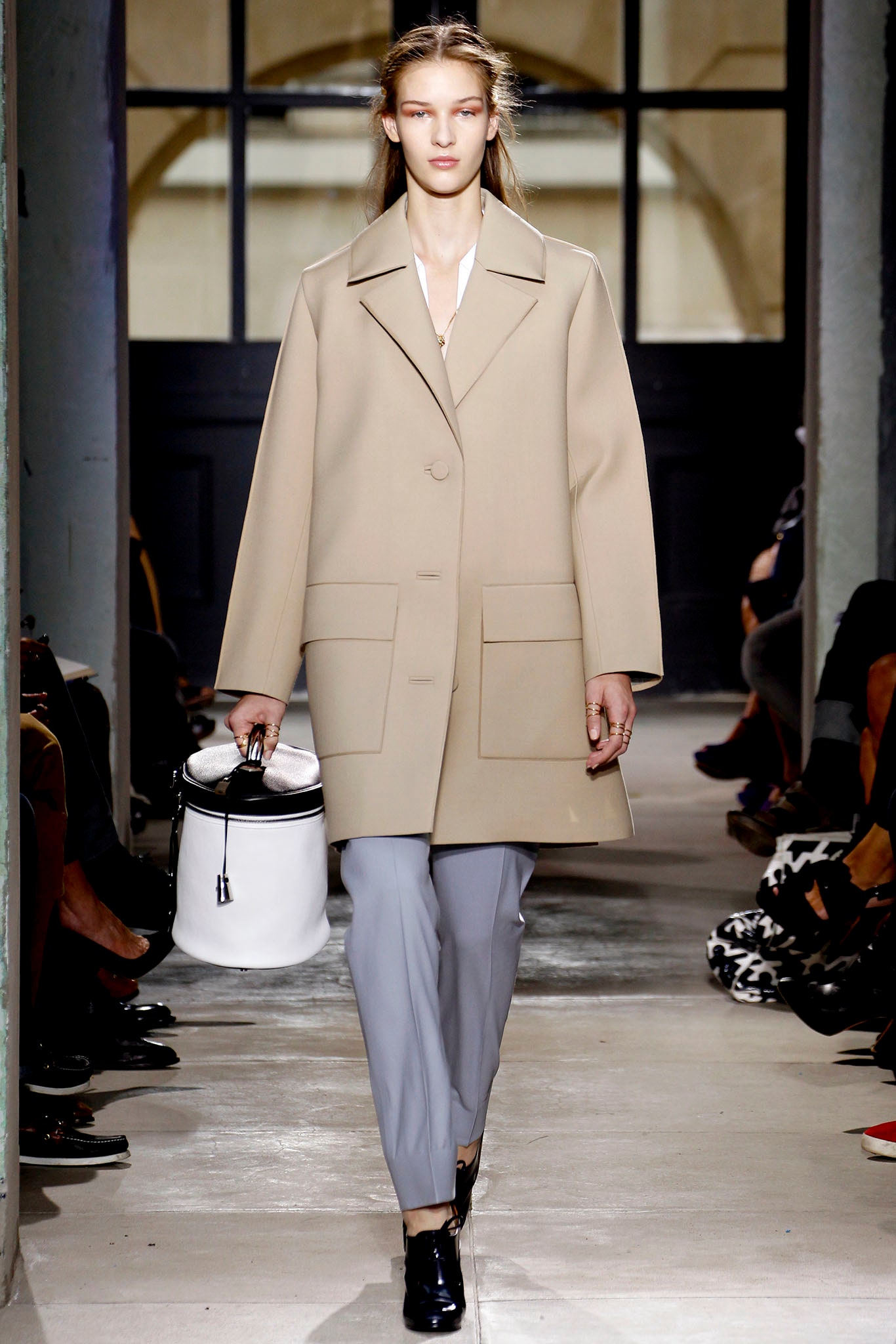 beige coat gray pants black shoes