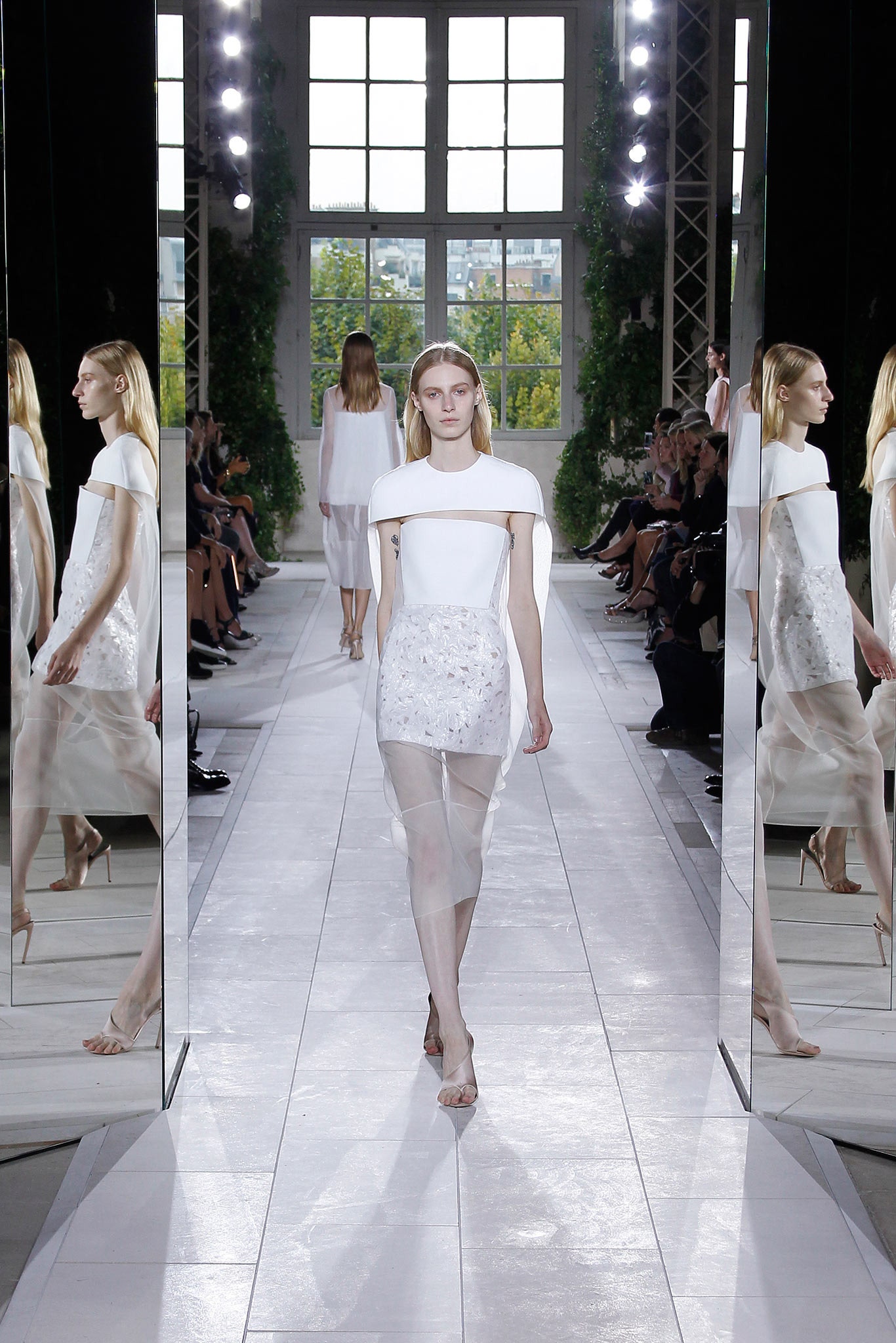 white silk sleeveless mini dress