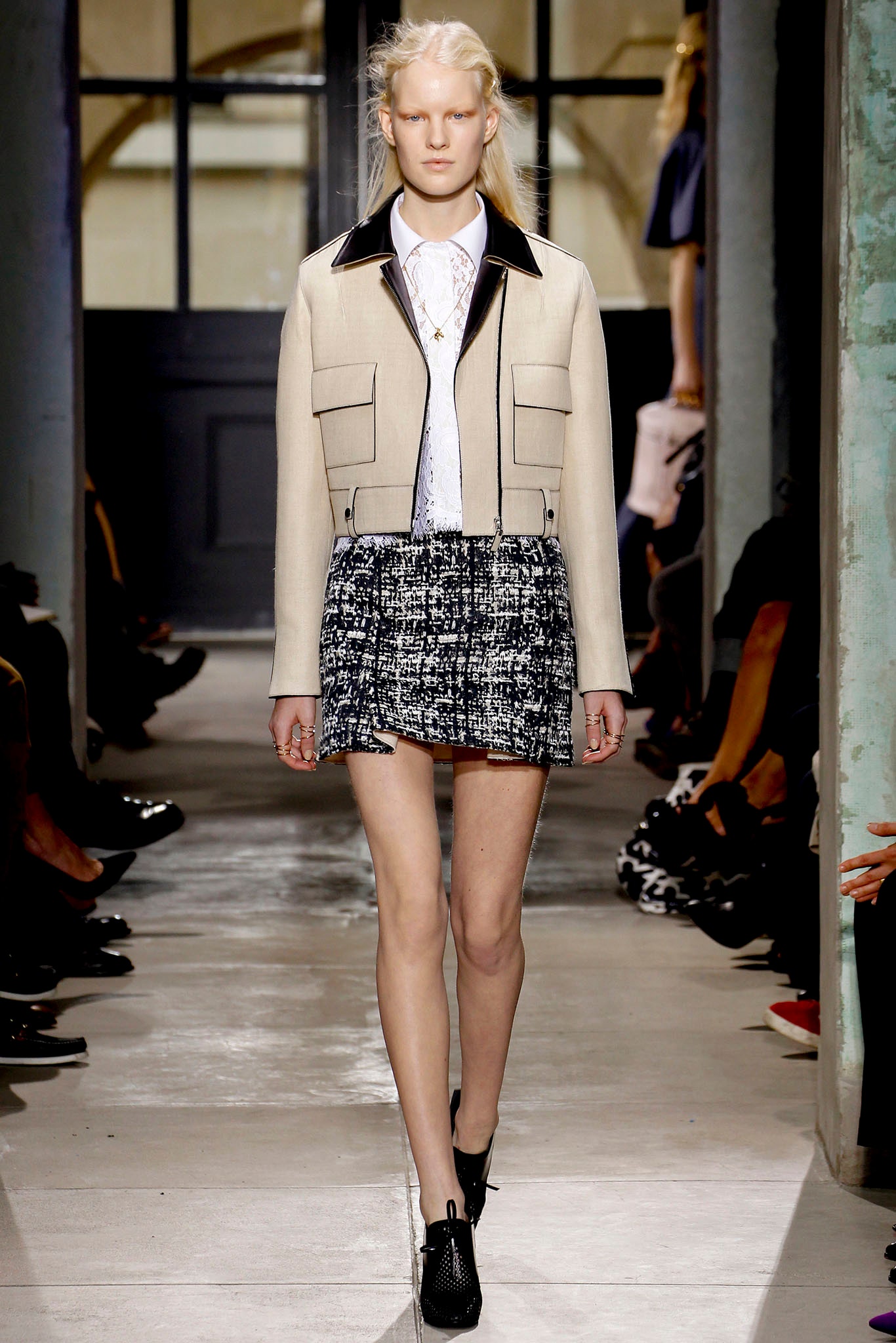 beige fitted jacket with mini skirt