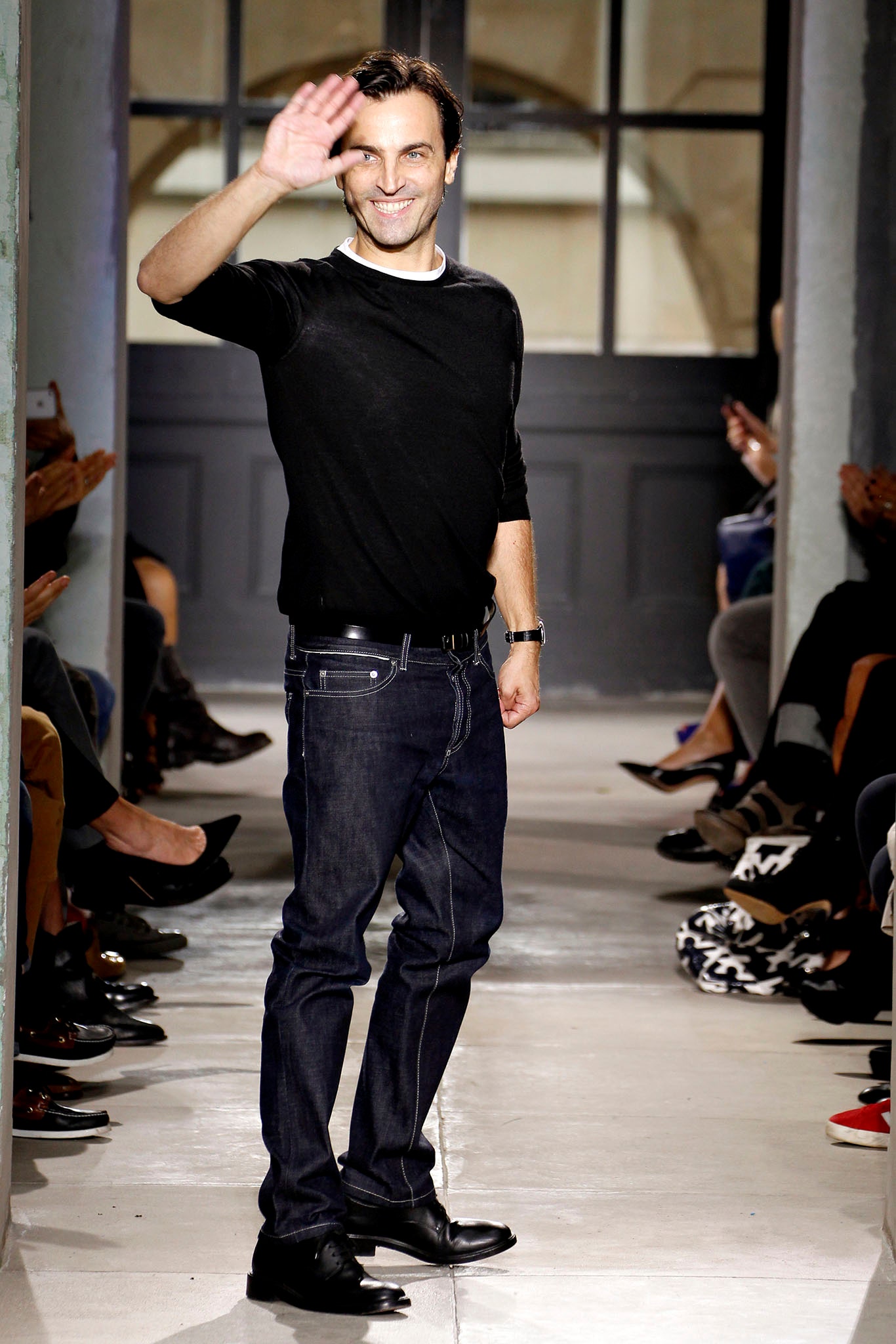black shirt blue jeans